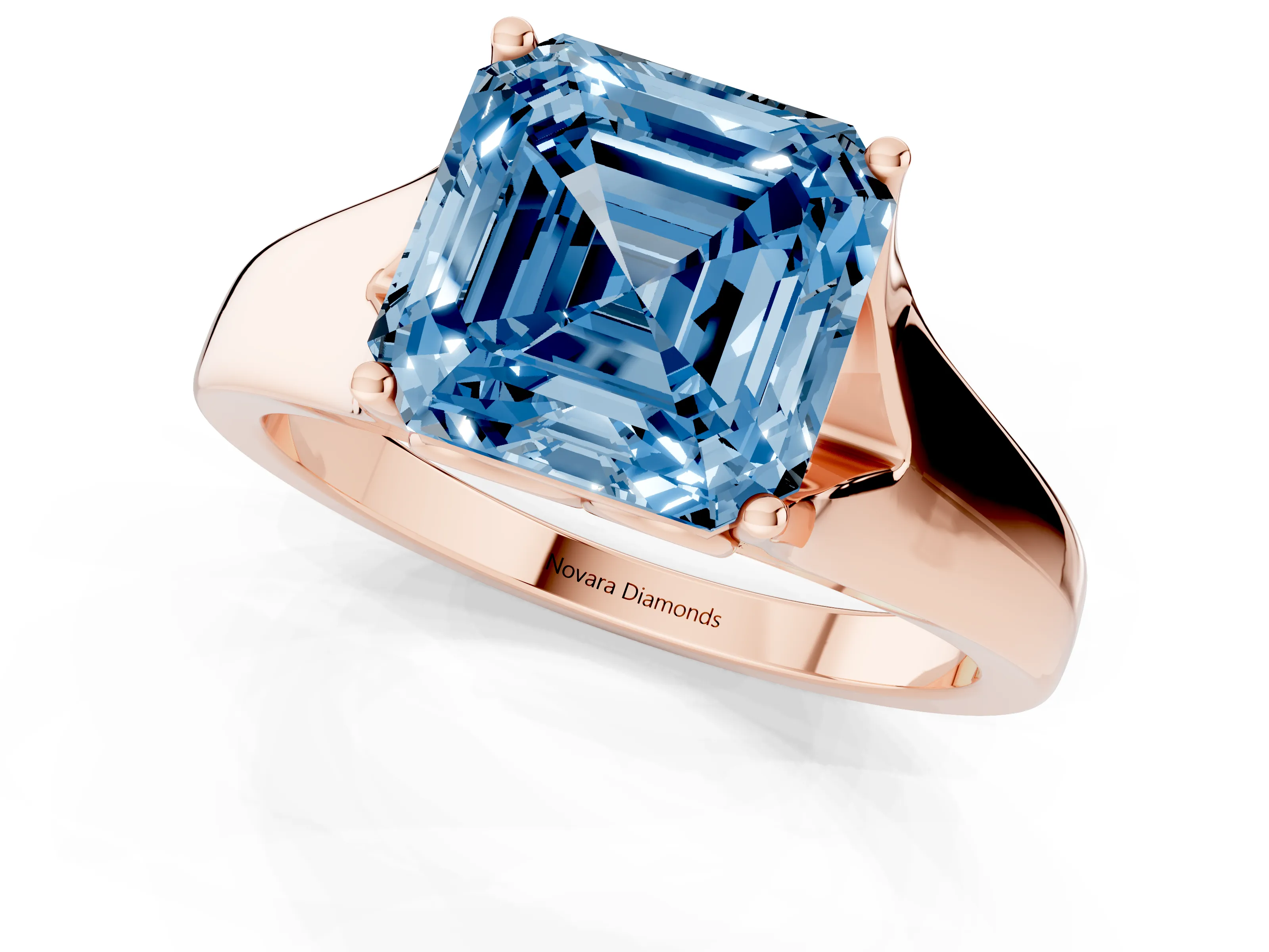 Fancy Blue Asscher Cut Diamond Solitaire Ring Set in Rose gold with Arched Cathedral Band and Prong Setting