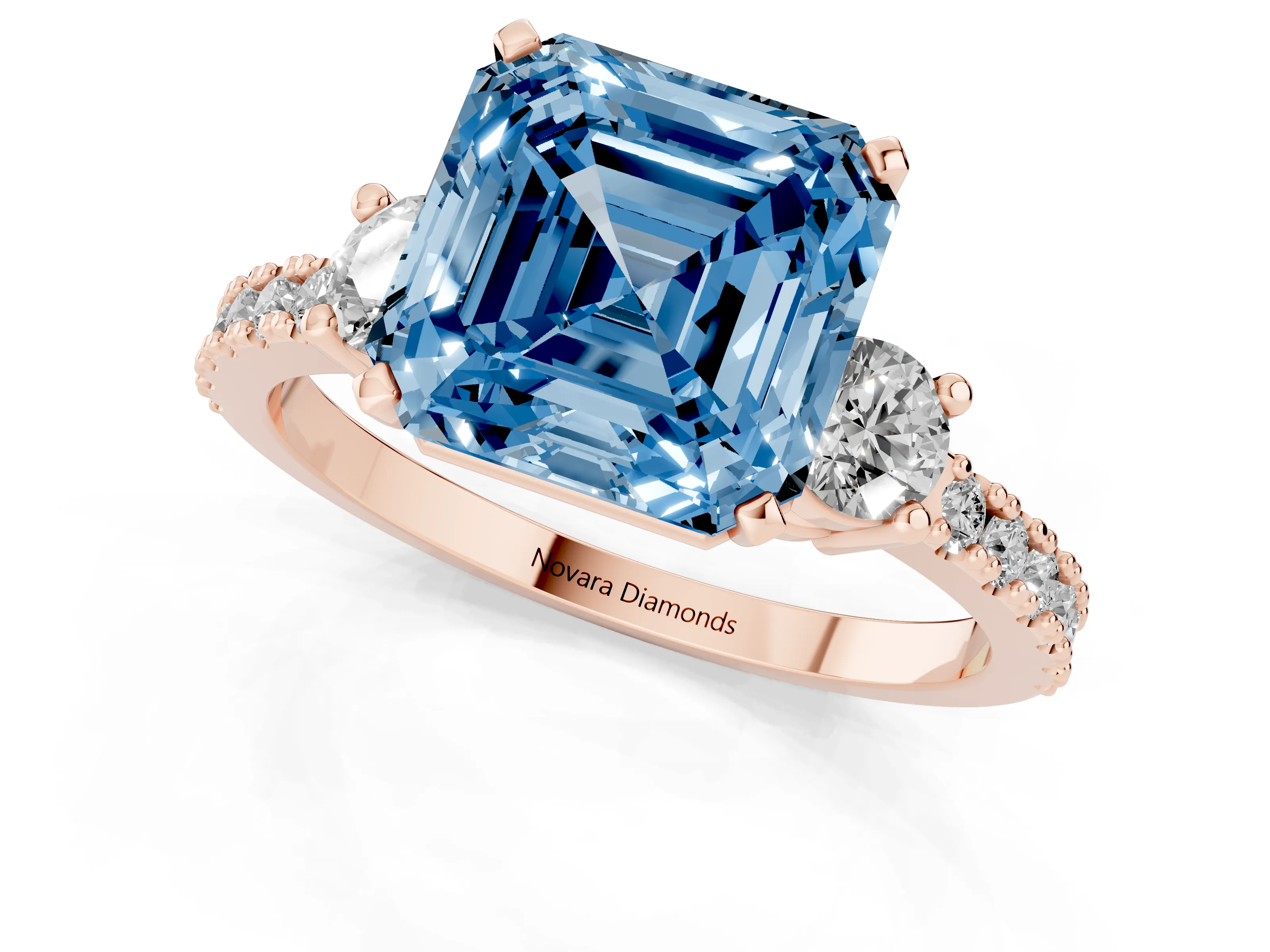Fancy Blue Three-Stone Asscher Cut Diamond Pavé Band Ring Set in Rose gold with Prong Setting