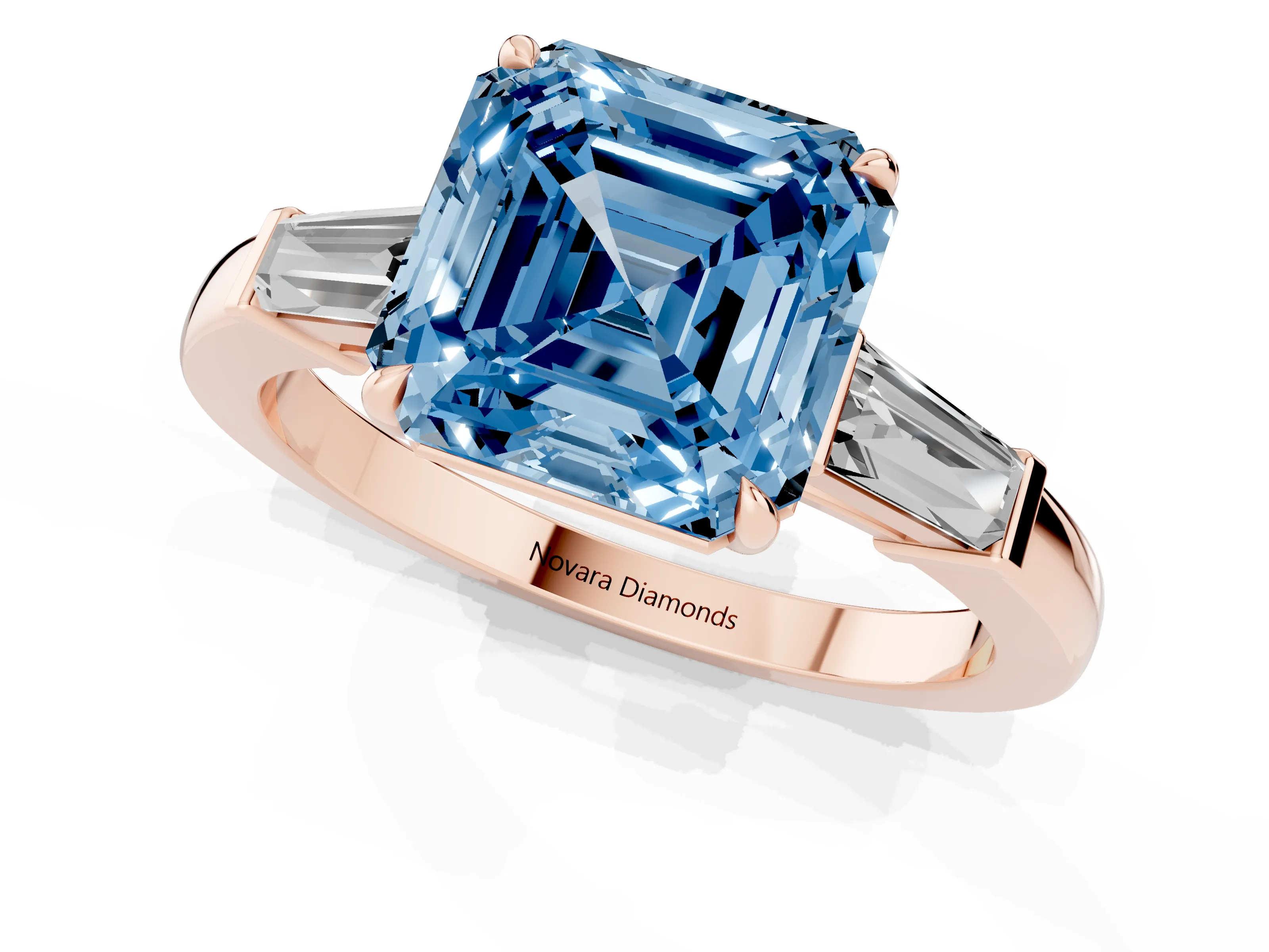 Fancy Blue Asscher Cut Diamond Three-Stone Ring Set in Rose gold with Tapered Baguette Side Stones and Prong Setting