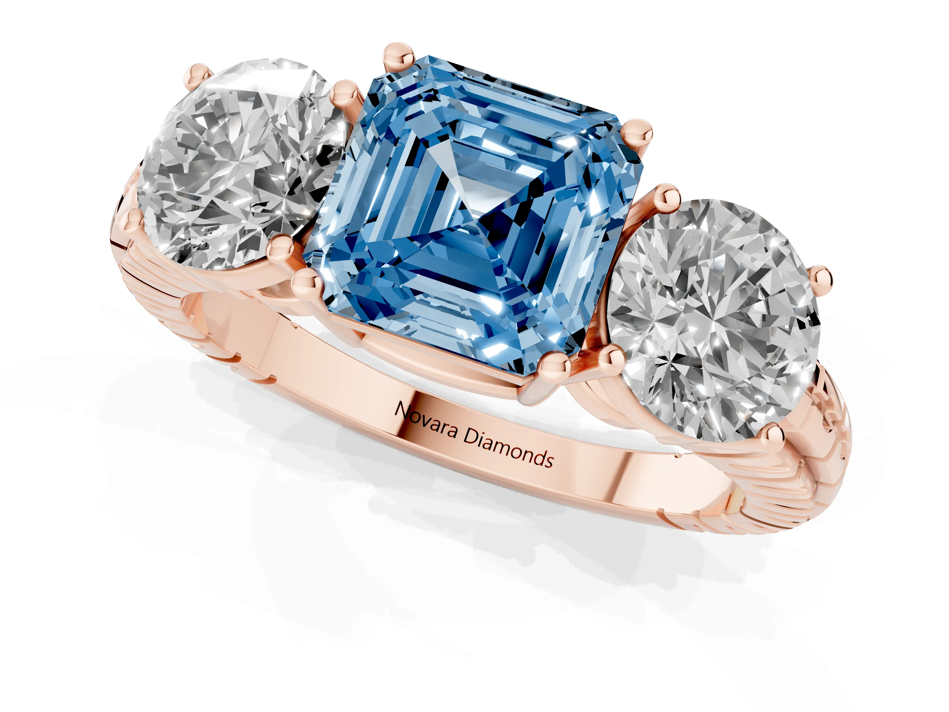 Fancy Blue Asscher Cut Diamond Three-Stone Ring Set in Rose gold with Channel-Set Accent Band