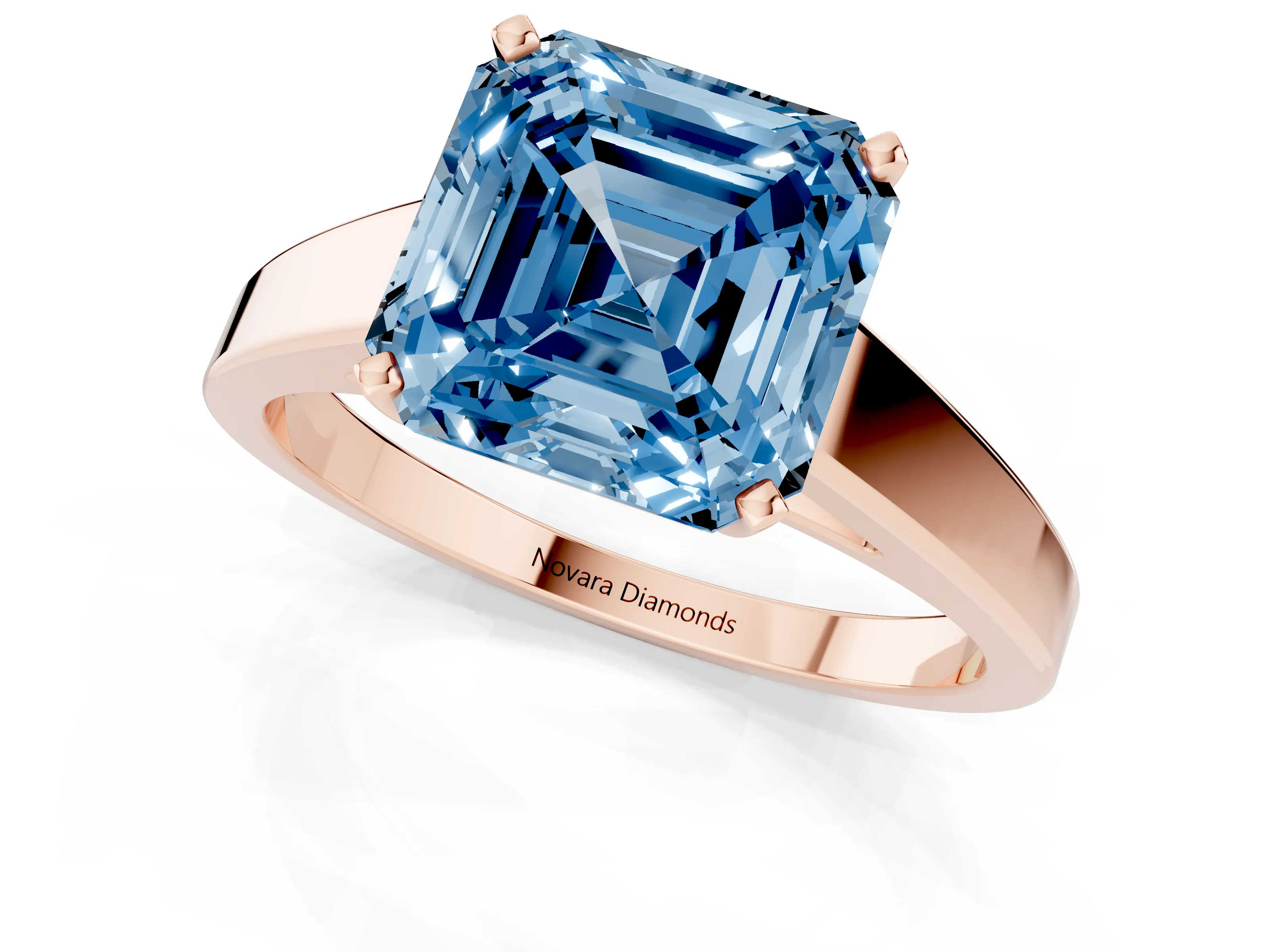 Fancy Blue Asscher Cut Diamond Solitaire Engagement Ring Set in Rose gold with Prong Setting and Tapered Band