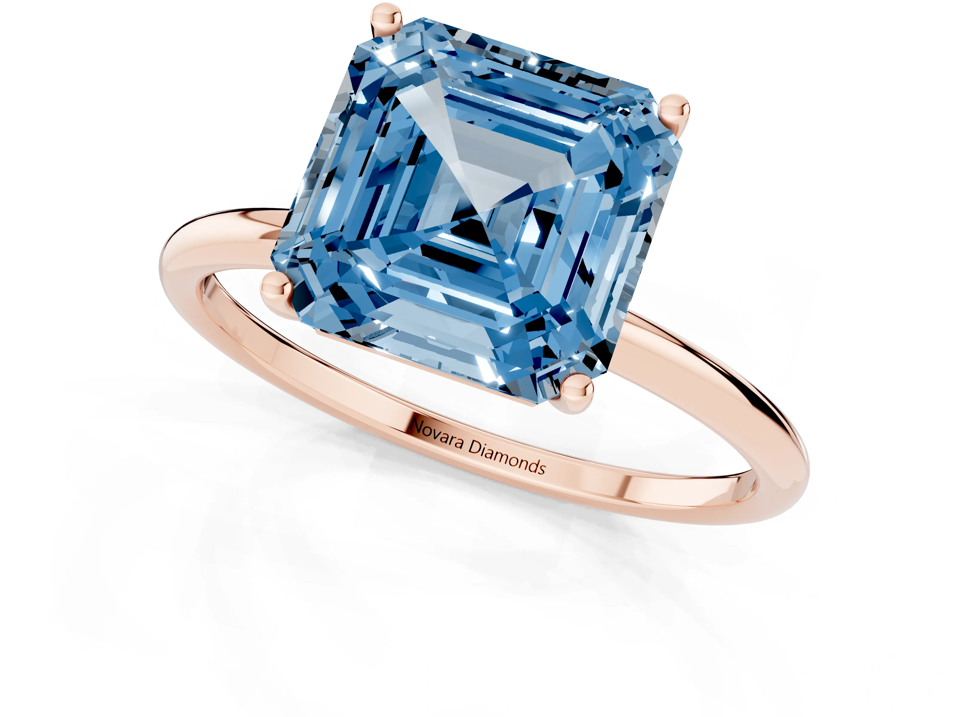 Fancy Blue Asscher Cut Diamond Solitaire Engagement Ring Set in Rose gold with Thin Band and Prong Setting
