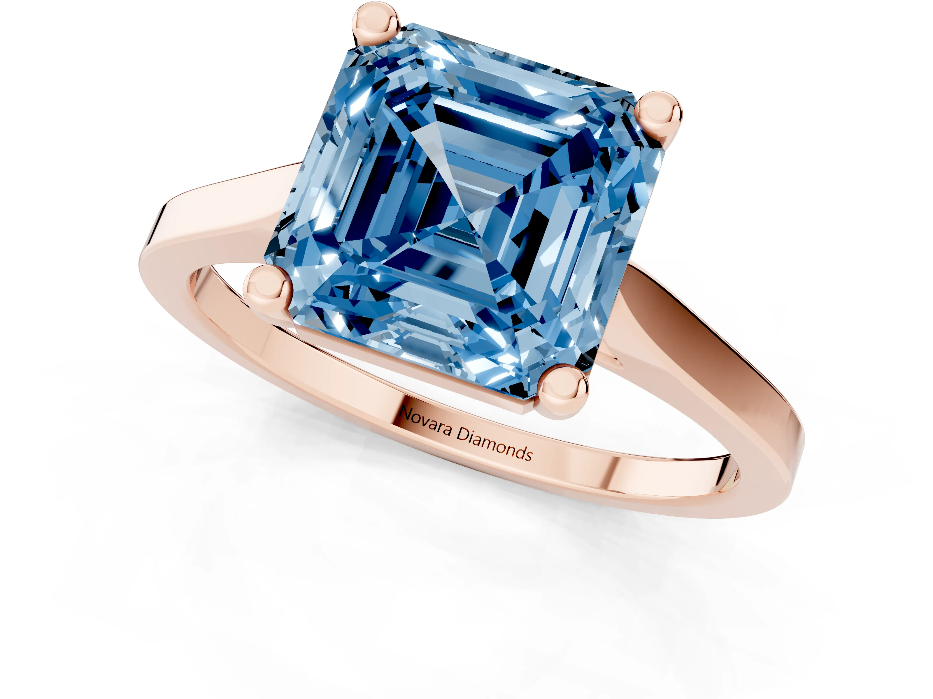 Fancy Blue Asscher Cut Diamond Solitaire Ring Set in Rose gold with Prong Setting and Tapered Band