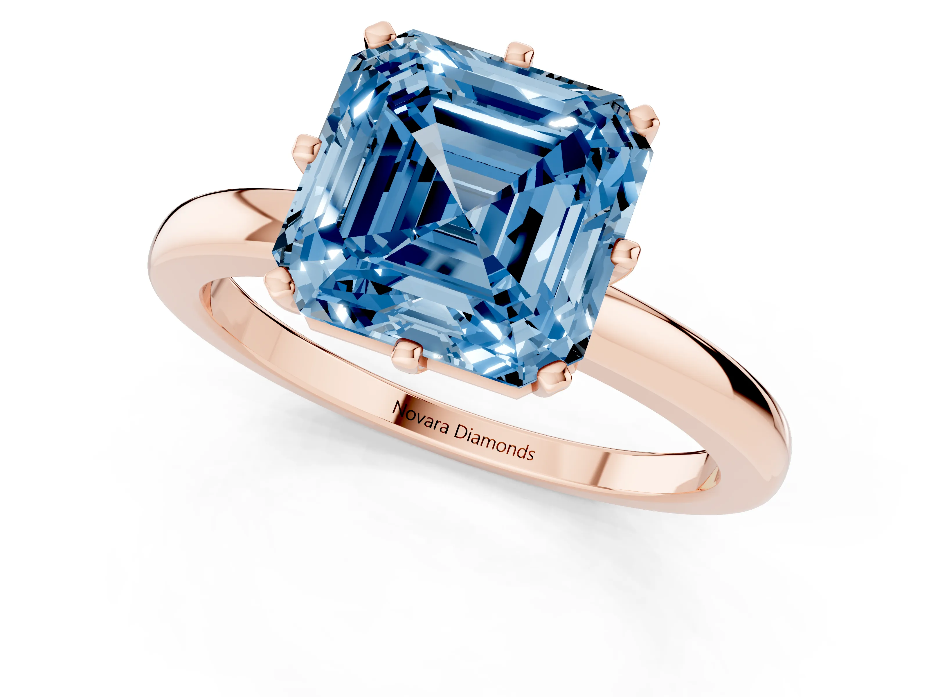 Fancy Blue Asscher Cut Diamond Solitaire Ring Set in Rose gold with Raised Prong Setting on a Classic Band