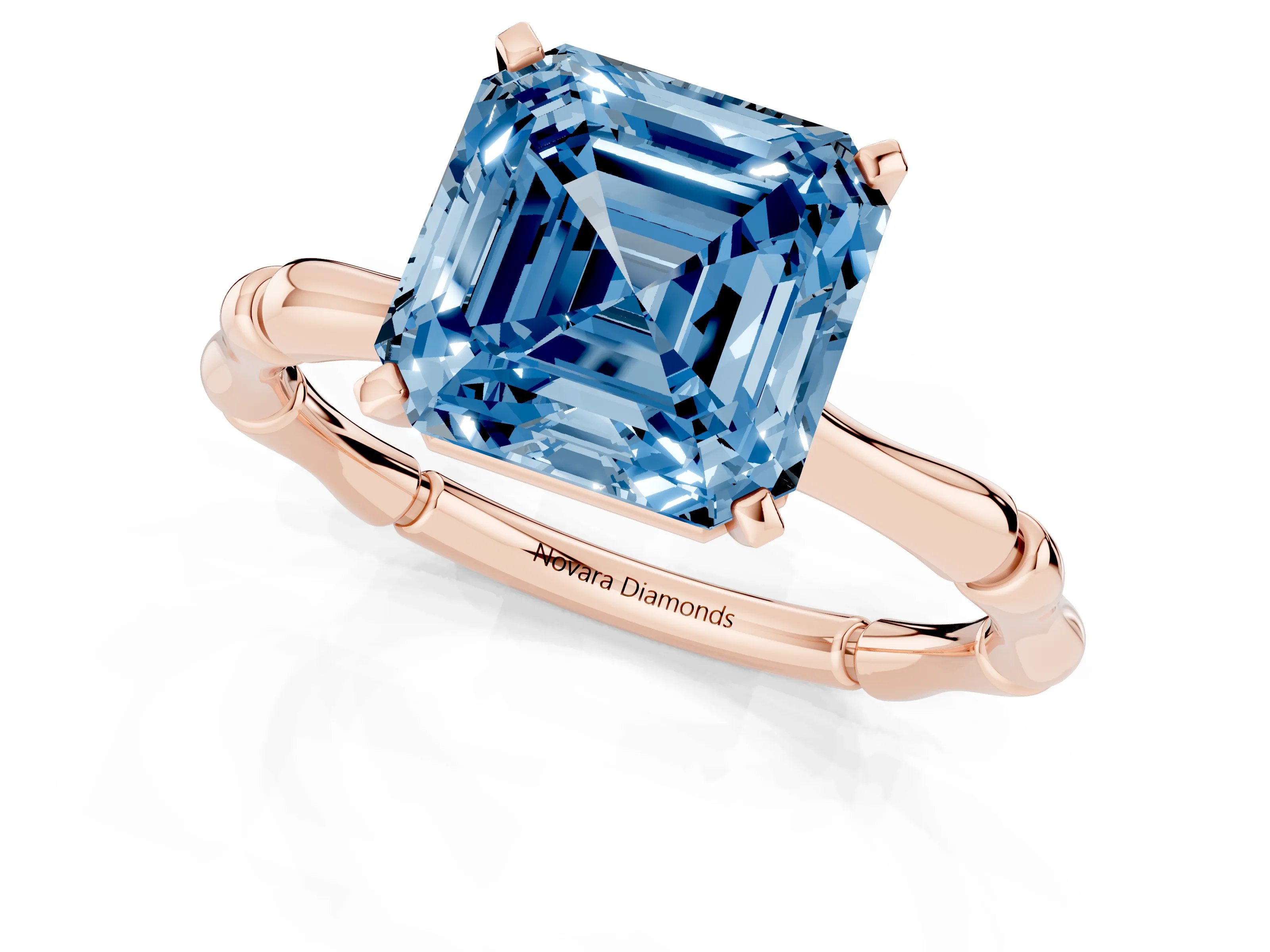 Fancy Blue Asscher Cut Diamond Solitaire Ring Set in Rose gold with Bamboo Band and Prong Setting