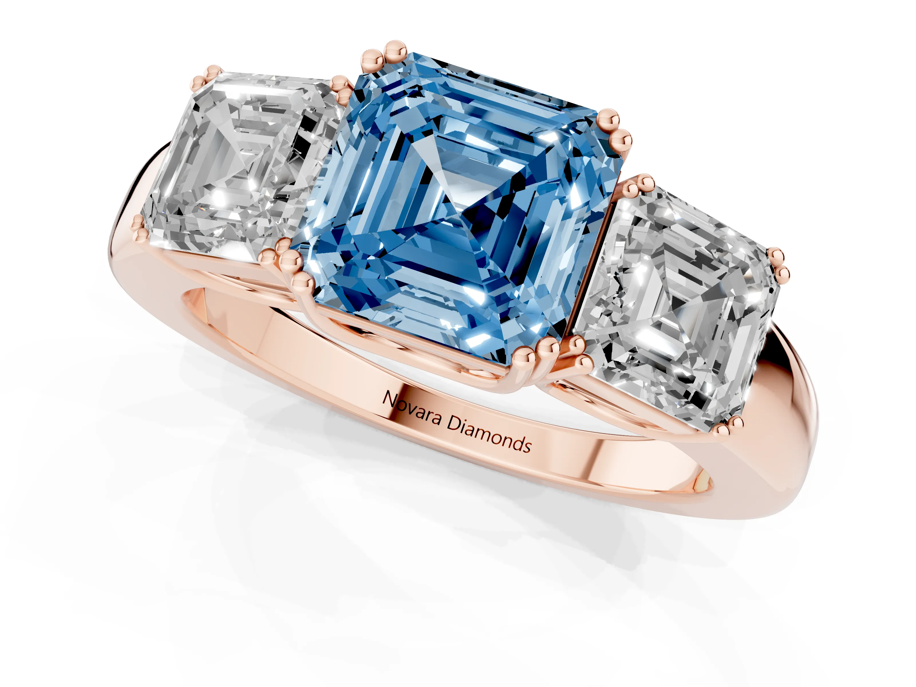 Fancy Blue Asscher Cut Diamond Three-Stone Ring Set in Rose gold with Polished Band and Prong Setting – second view