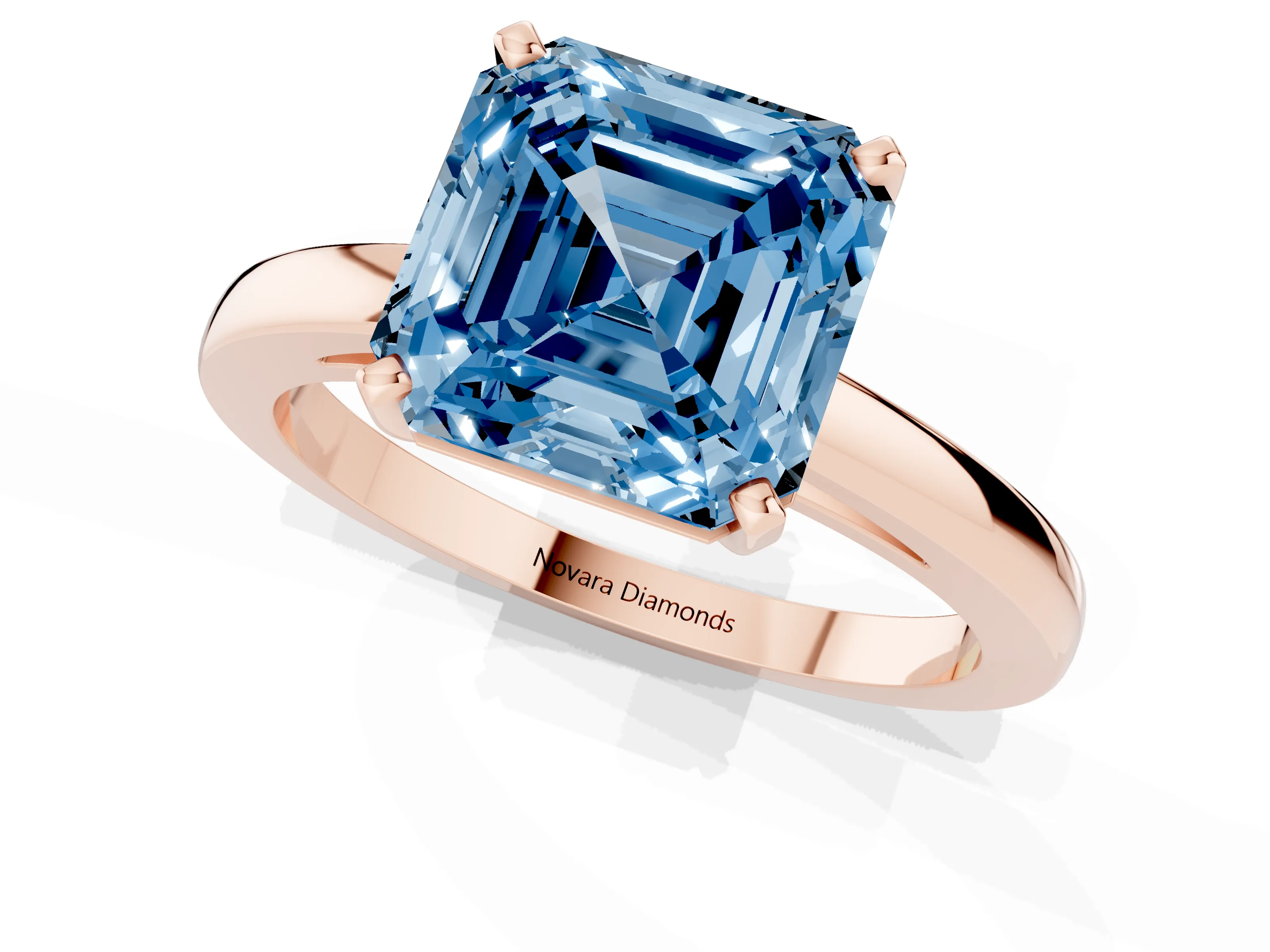 Fancy Blue Asscher Cut Diamond Solitaire Engagement Ring Set in Rose gold with Prong Setting on a Classic Band