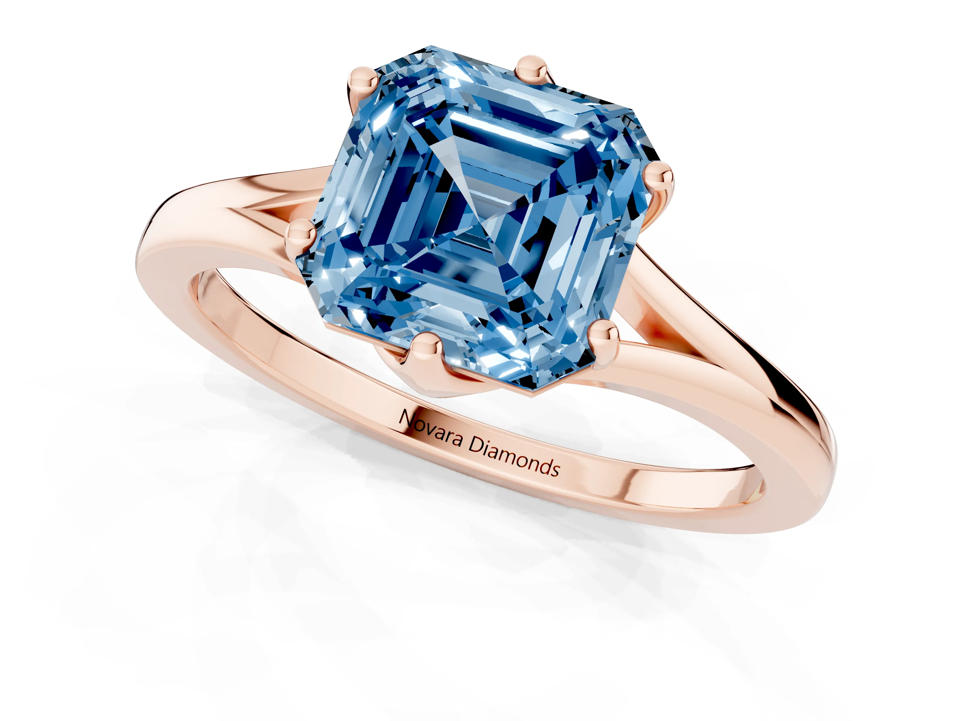 Fancy Blue Asscher Cut Diamond Solitaire Ring Set in Rose gold with Polished Tapered Band and Prong Setting