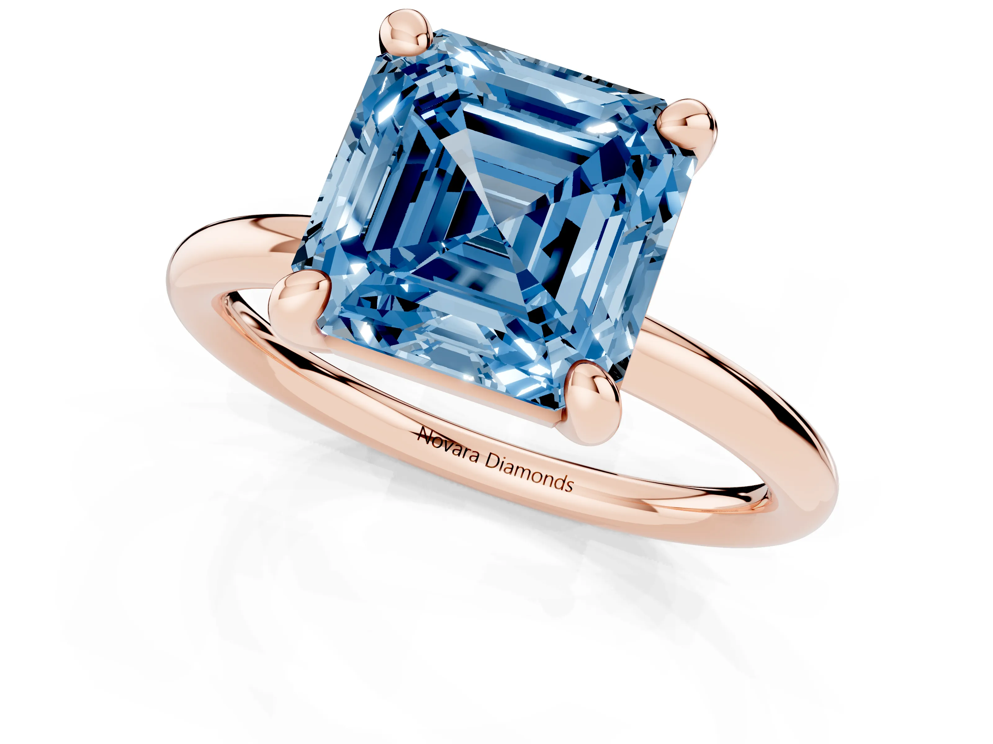Fancy Blue Asscher Cut Diamond Solitaire Ring Set in Rose gold with Prong Setting on a Polished Plain Band