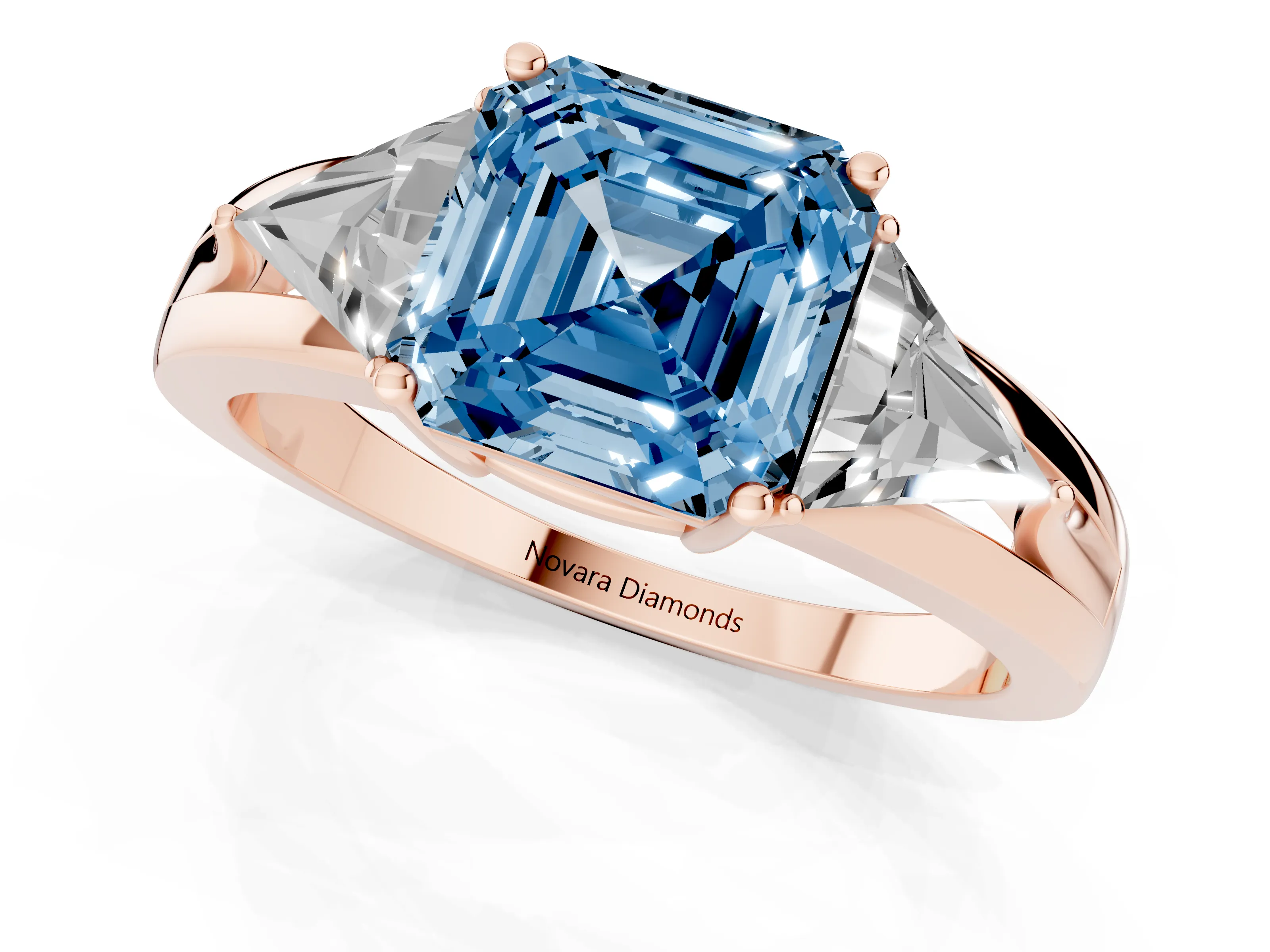 Fancy Blue Asscher Cut Diamond Three-Stone Ring Set in Rose gold with Trillion Side Stones and Split Shank
