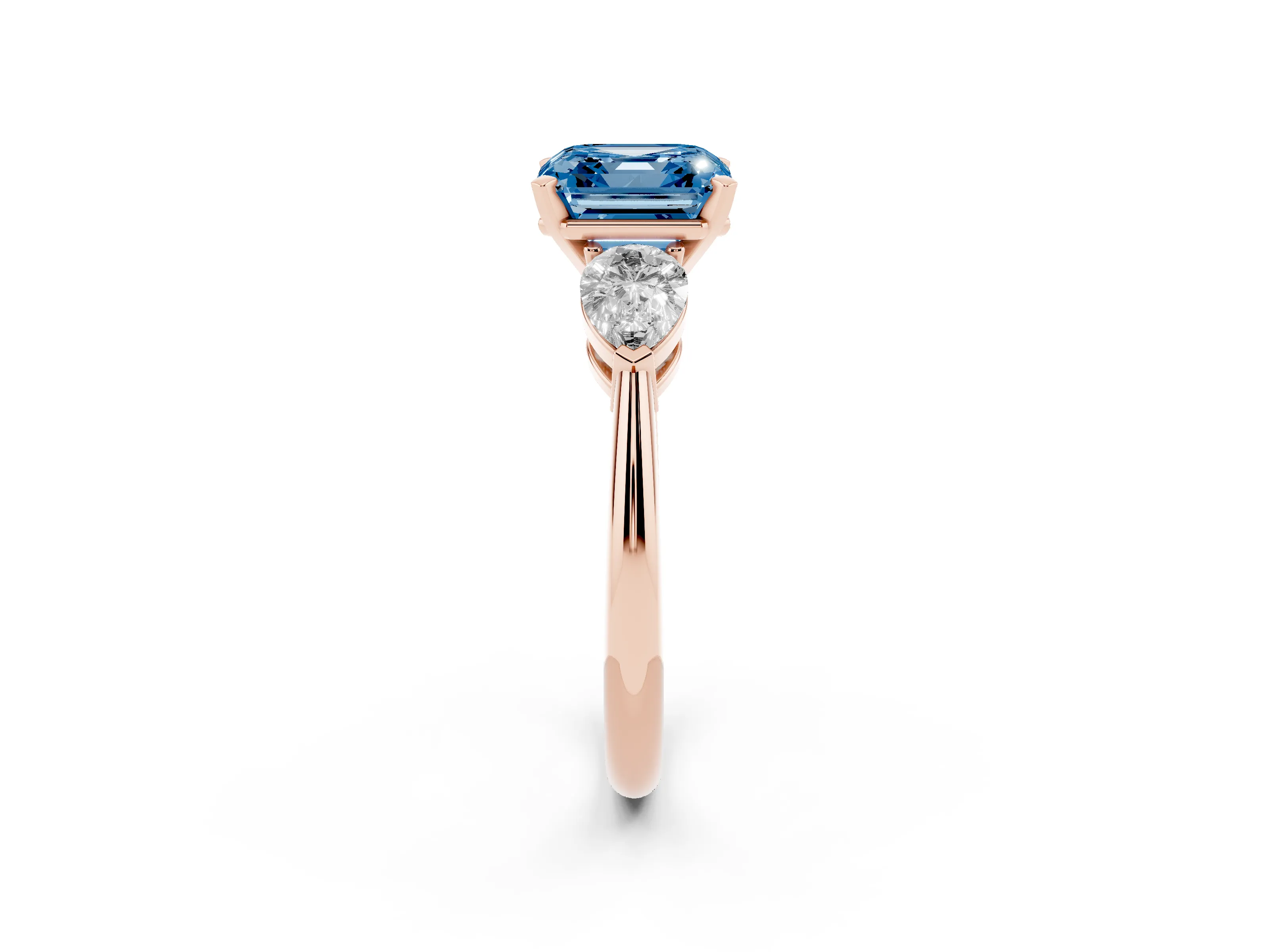 Fancy Blue Three-Stone Asscher Cut Diamond Ring Set in Rose gold with Pear Side Stones and Prong Setting