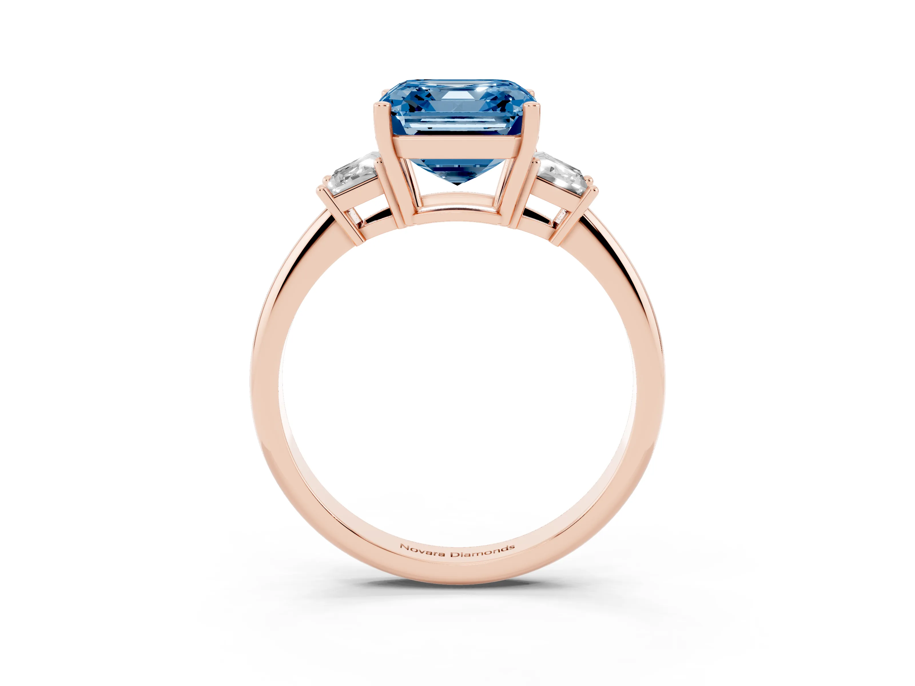 Fancy Blue Asscher Cut Diamond Three-Stone Ring Set in Rose gold with Trapezoid Side Stones and Prong Setting