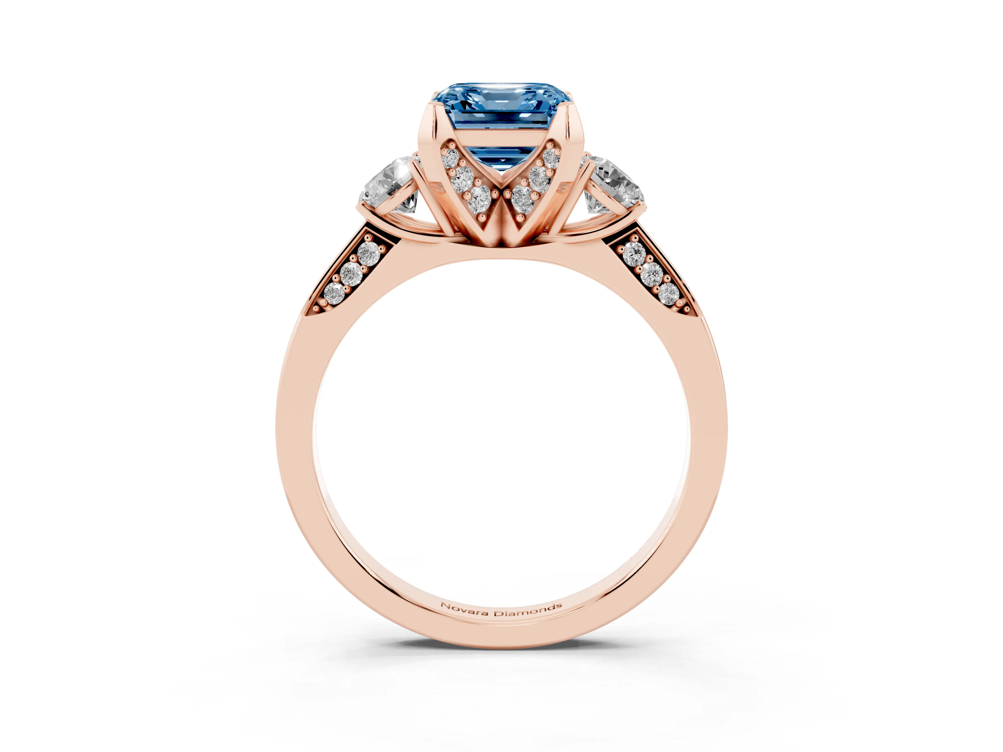 Fancy Blue Asscher Cut Diamond Three-Stone Ring Set in Rose gold with Pavé Band and Smaller Side Stones