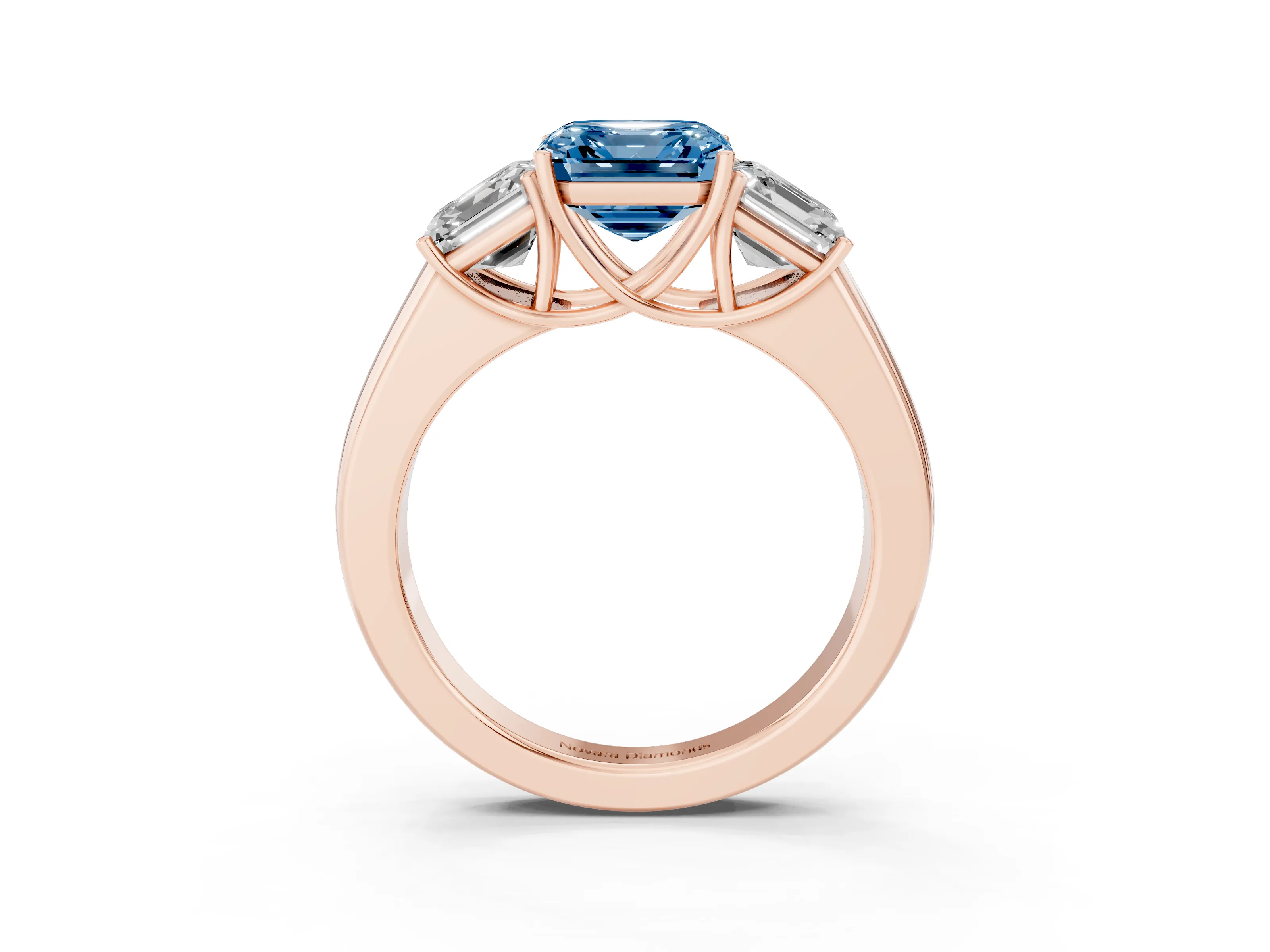 Fancy Blue Three-Stone Asscher Cut Diamond Ring Set in Rose gold with Matching Prong Settings and Plain Band