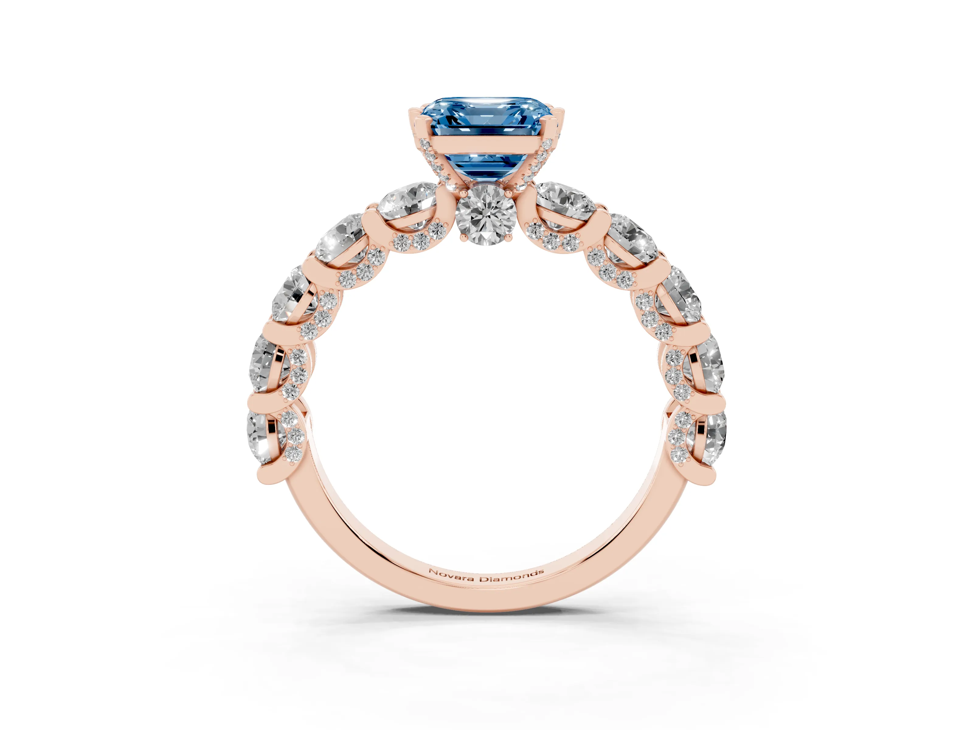 Fancy Blue Asscher Cut Diamond Side Stone Ring Set in Rose gold with Alternating Round and Oval Side Stones