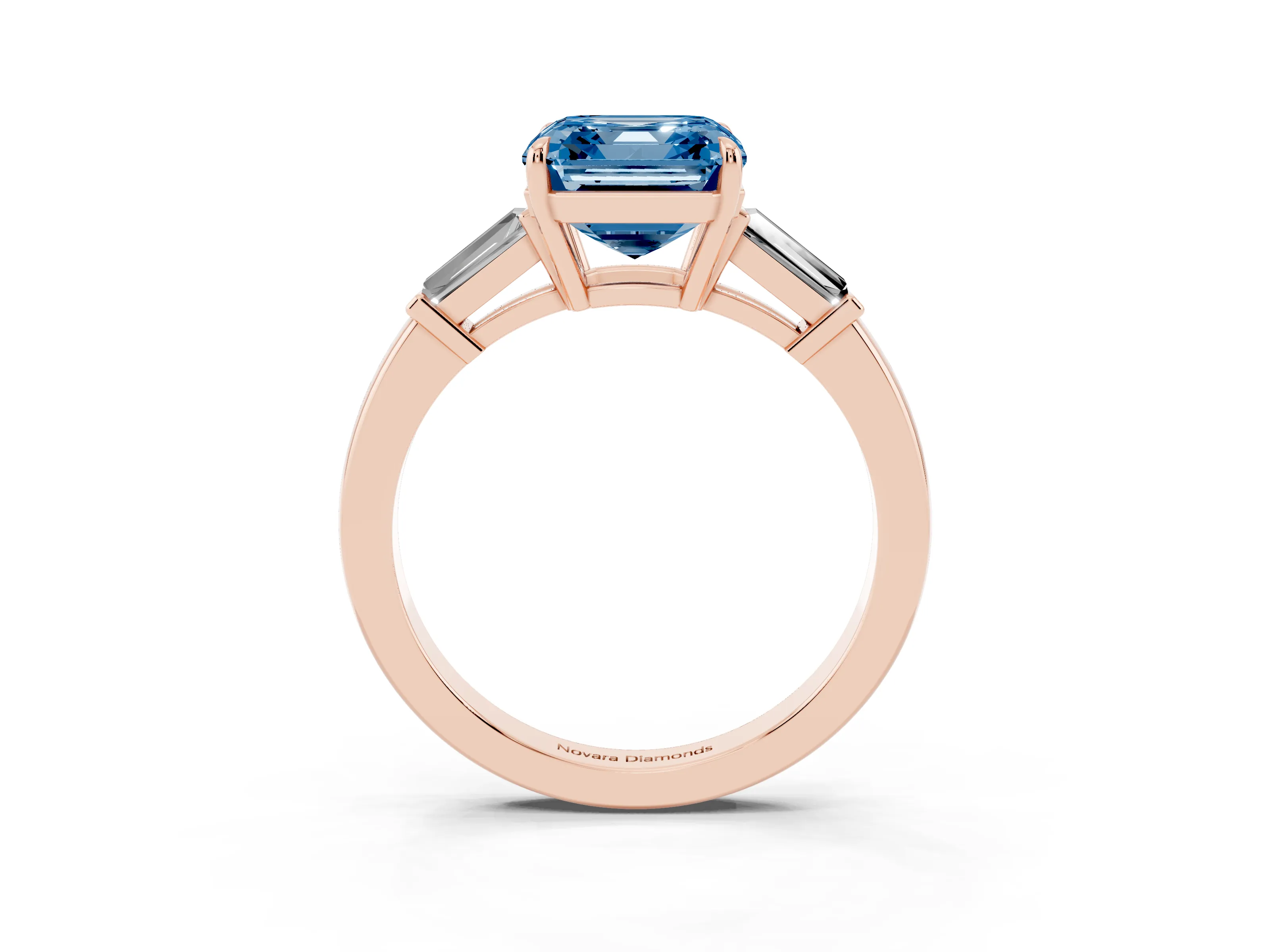 Fancy Blue Asscher Cut Diamond Three-Stone Ring Set in Rose gold with Tapered Baguette Side Stones and Prong Setting