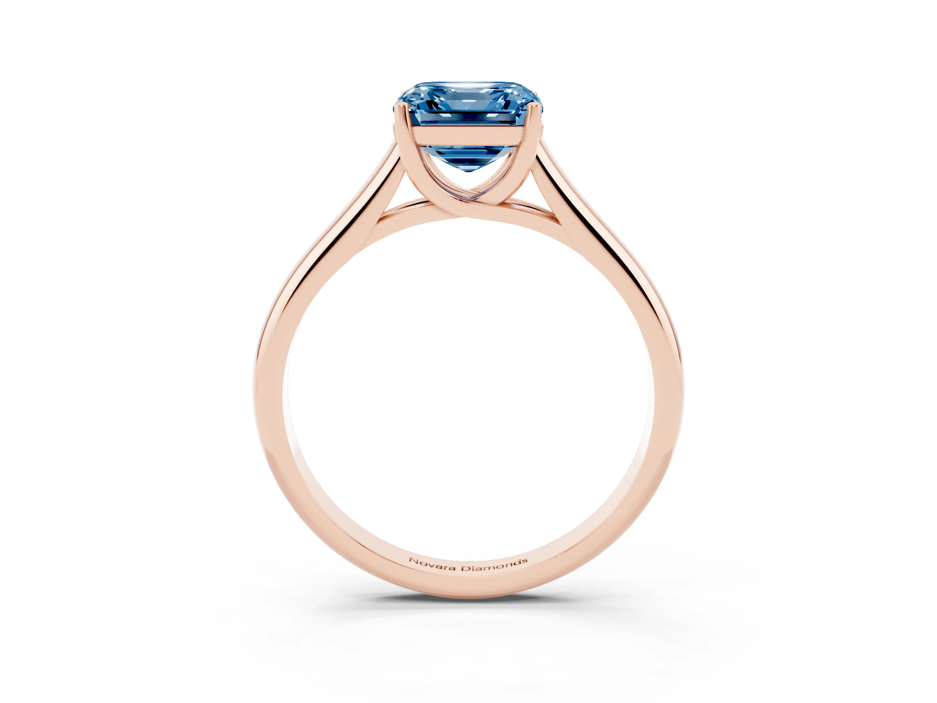 Fancy Blue Asscher Cut Diamond Solitaire Engagement Ring Set in Rose gold with Subtly Tapered Band and Prong Setting