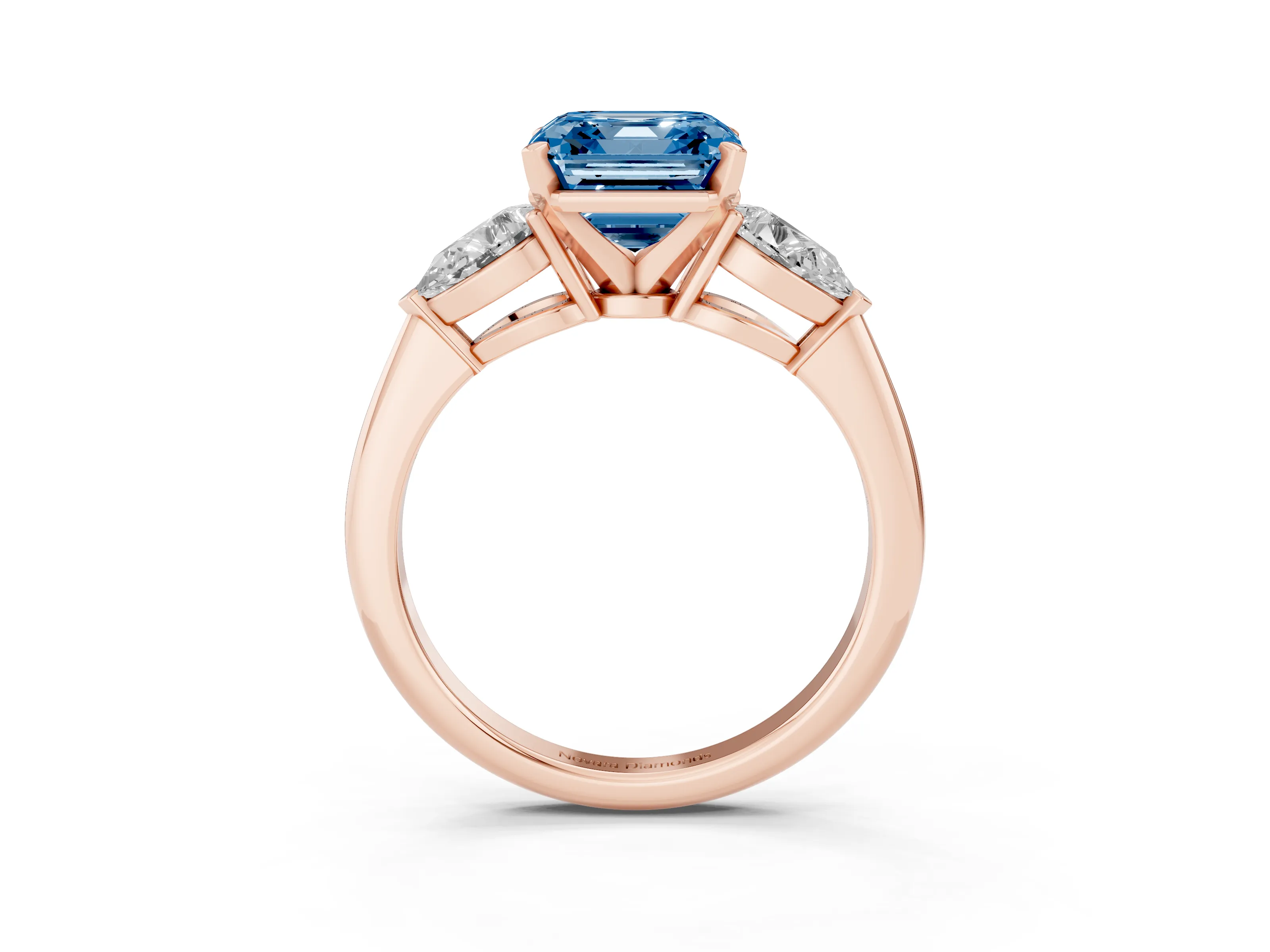 Fancy Blue Three-Stone Asscher Cut Diamond Ring Set in Rose gold with Pear Side Stones and Prong Setting