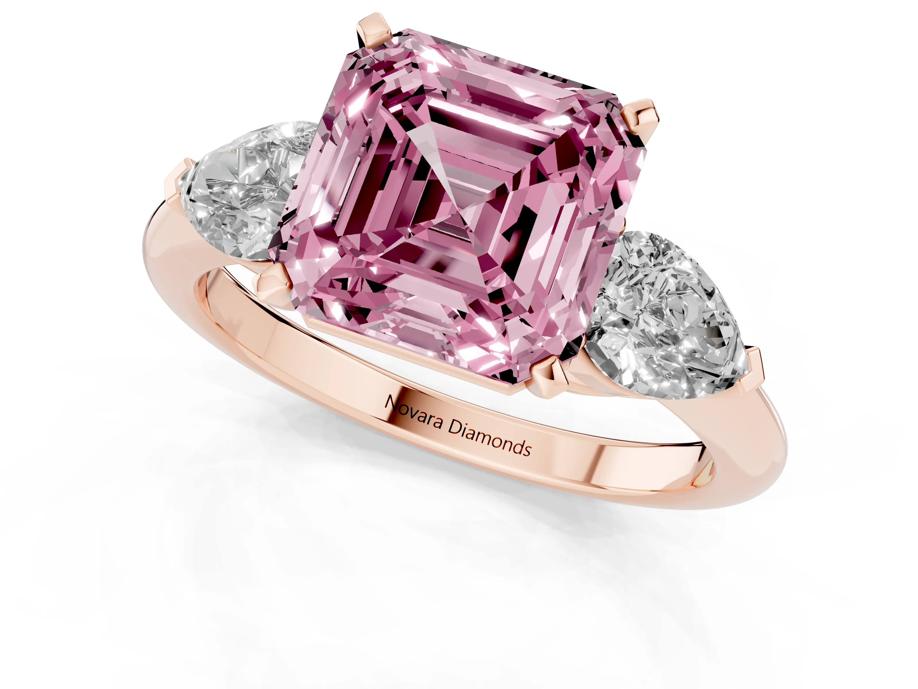 Fancy Pink Three-Stone Asscher Cut Diamond Ring Set in Rose gold with Pear Side Stones and Prong Setting