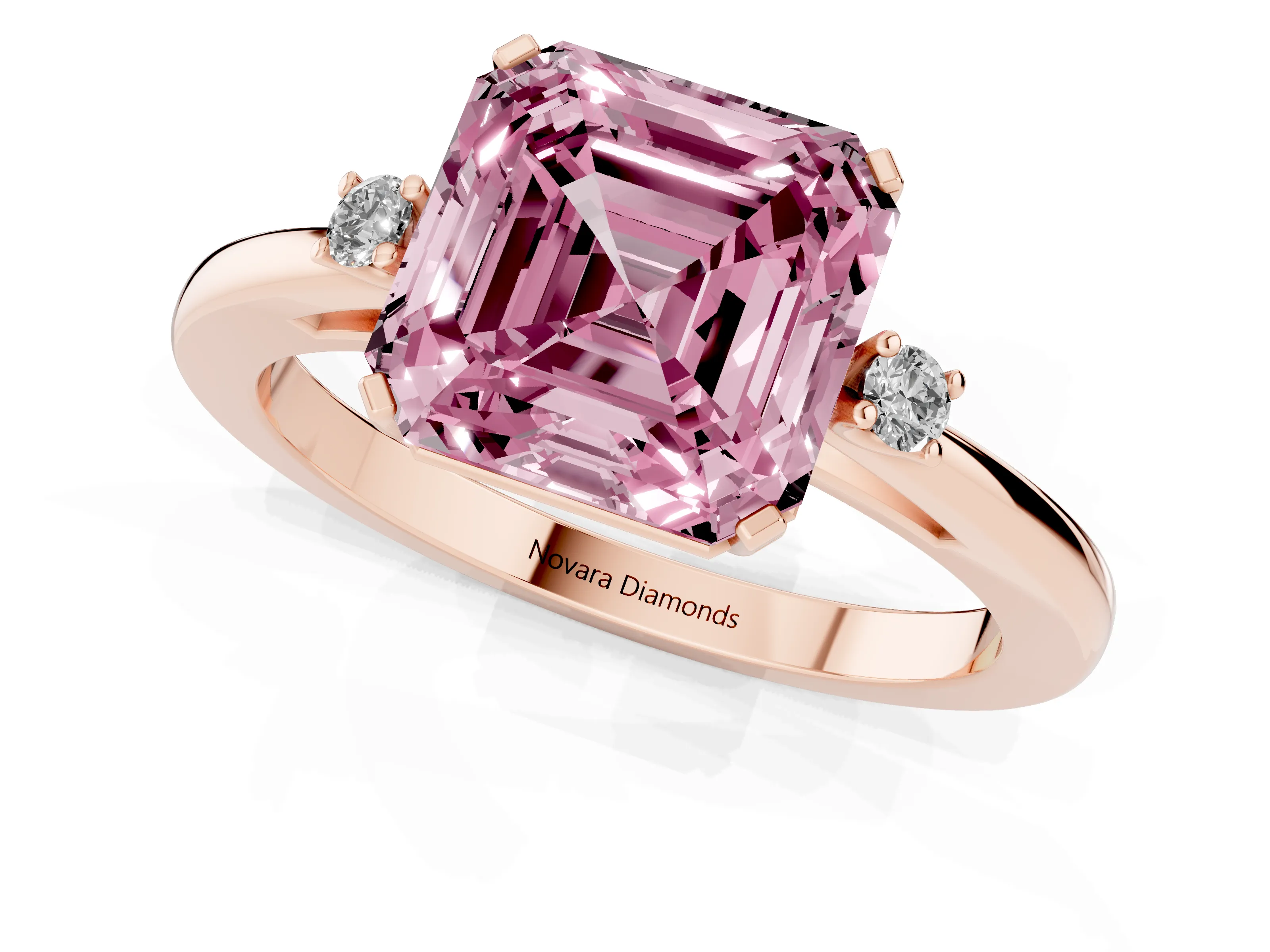 Fancy Pink Three-Stone Asscher Cut Diamond Solitaire Ring Set in Rose gold with Round Accent Stones and Prong Setting