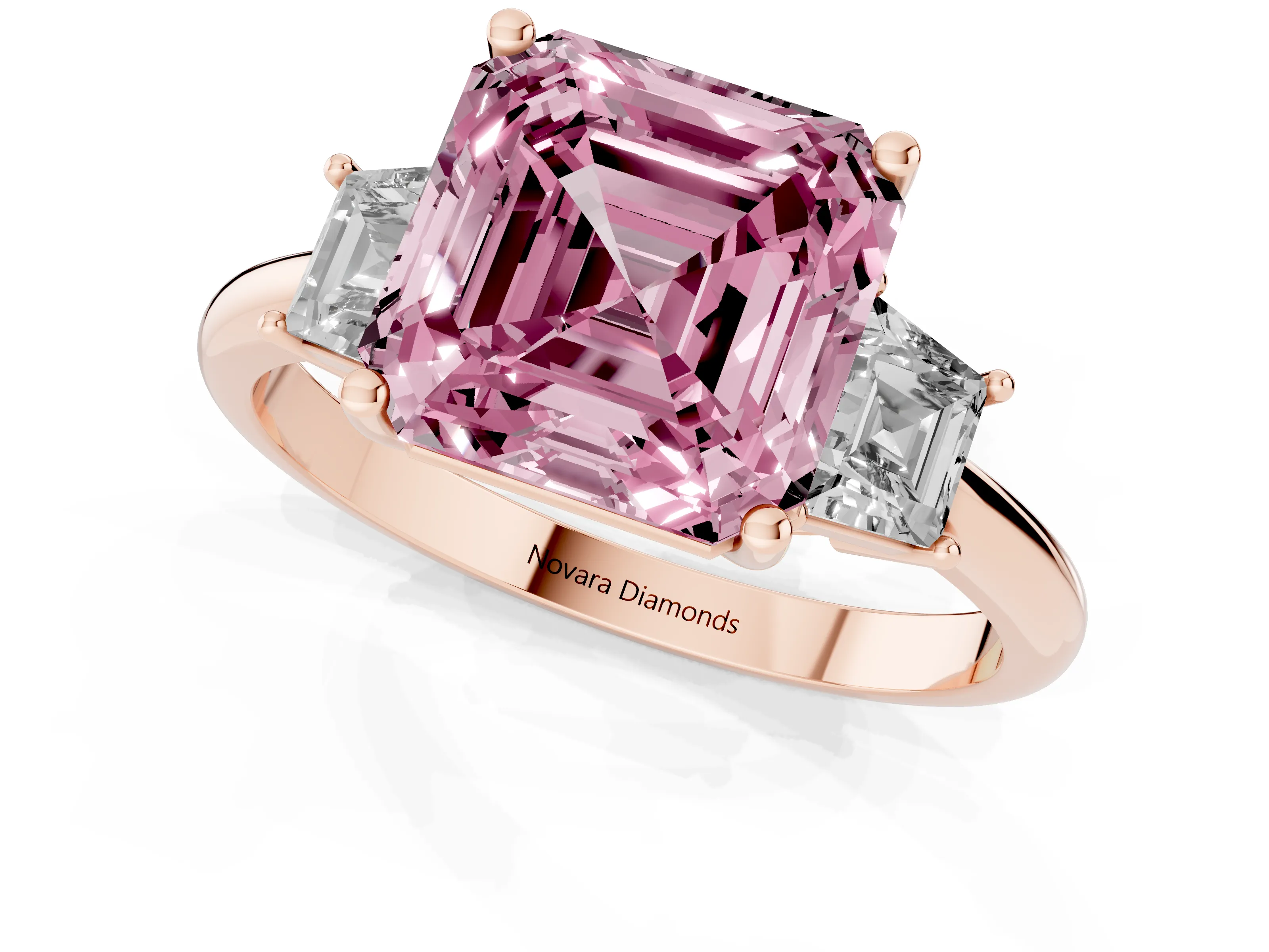 Fancy Pink Asscher Cut Diamond Three-Stone Ring Set in Rose gold with Trapezoid Side Stones and Prong Setting
