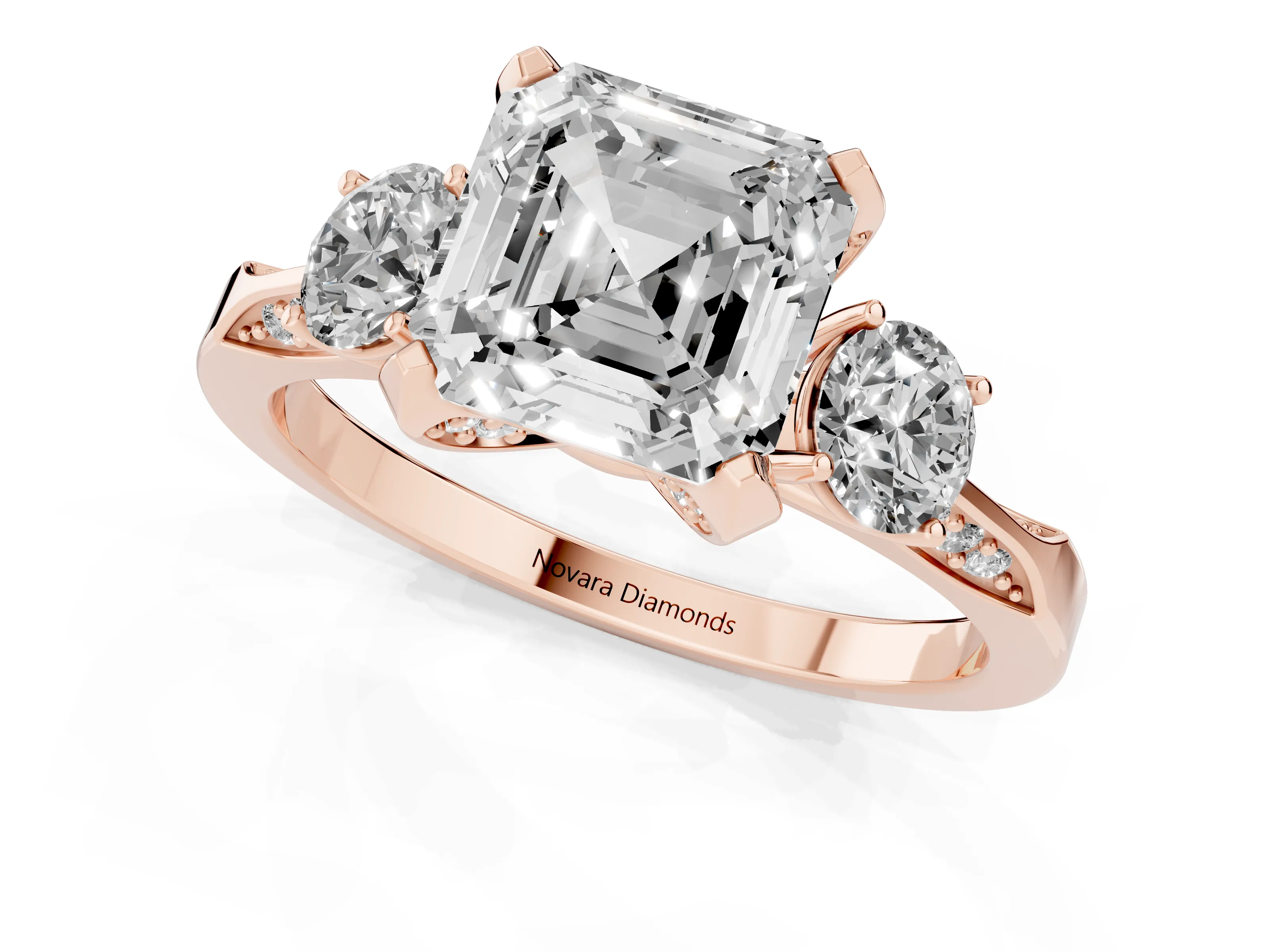 Asscher Cut Diamond Three-Stone Ring Set in Rose gold with Pavé Band and Smaller Side Stones