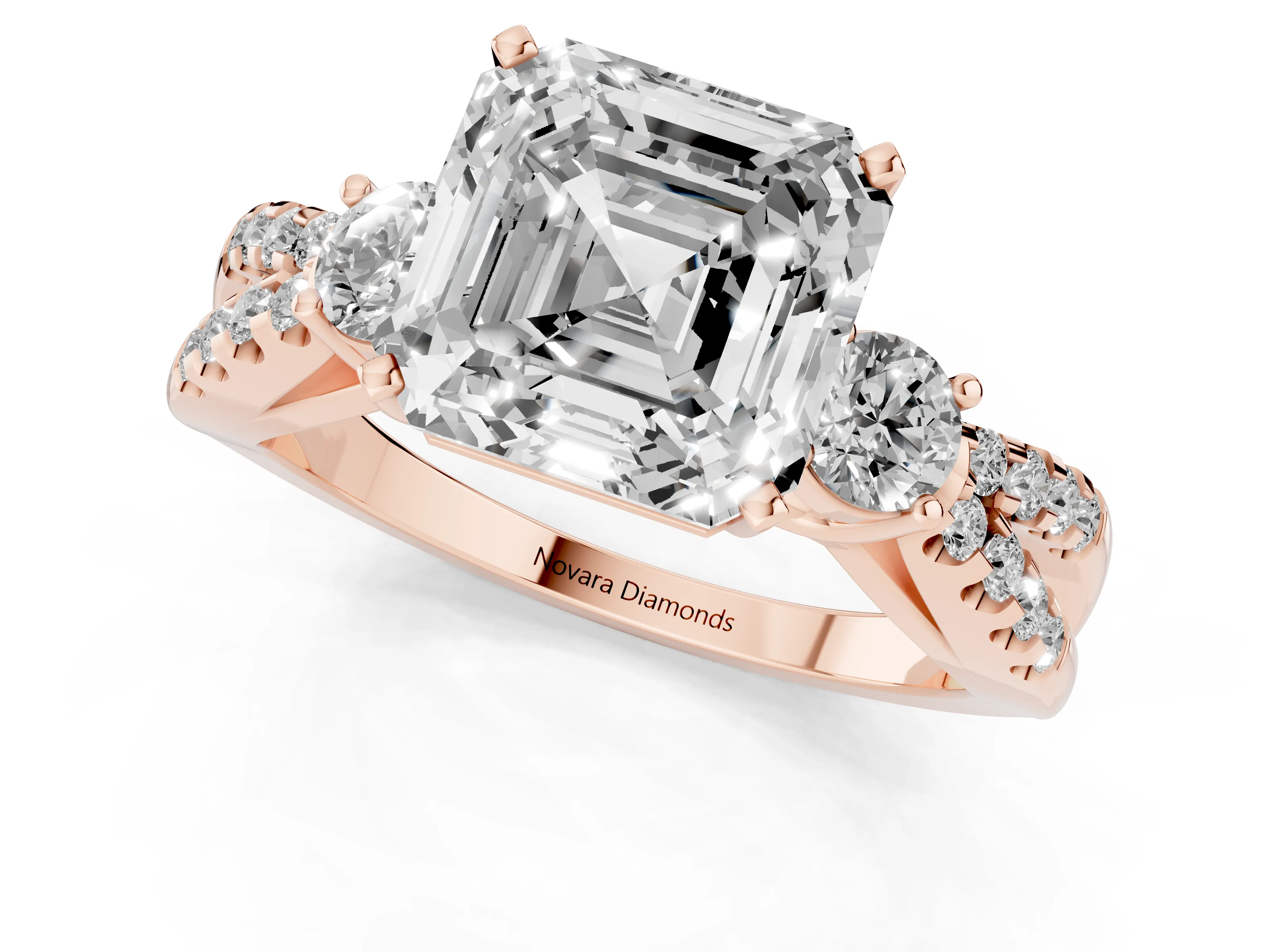 Asscher Cut Diamond Three-Stone Ring Set in Rose gold with Pavé Split Shank and Prong Setting