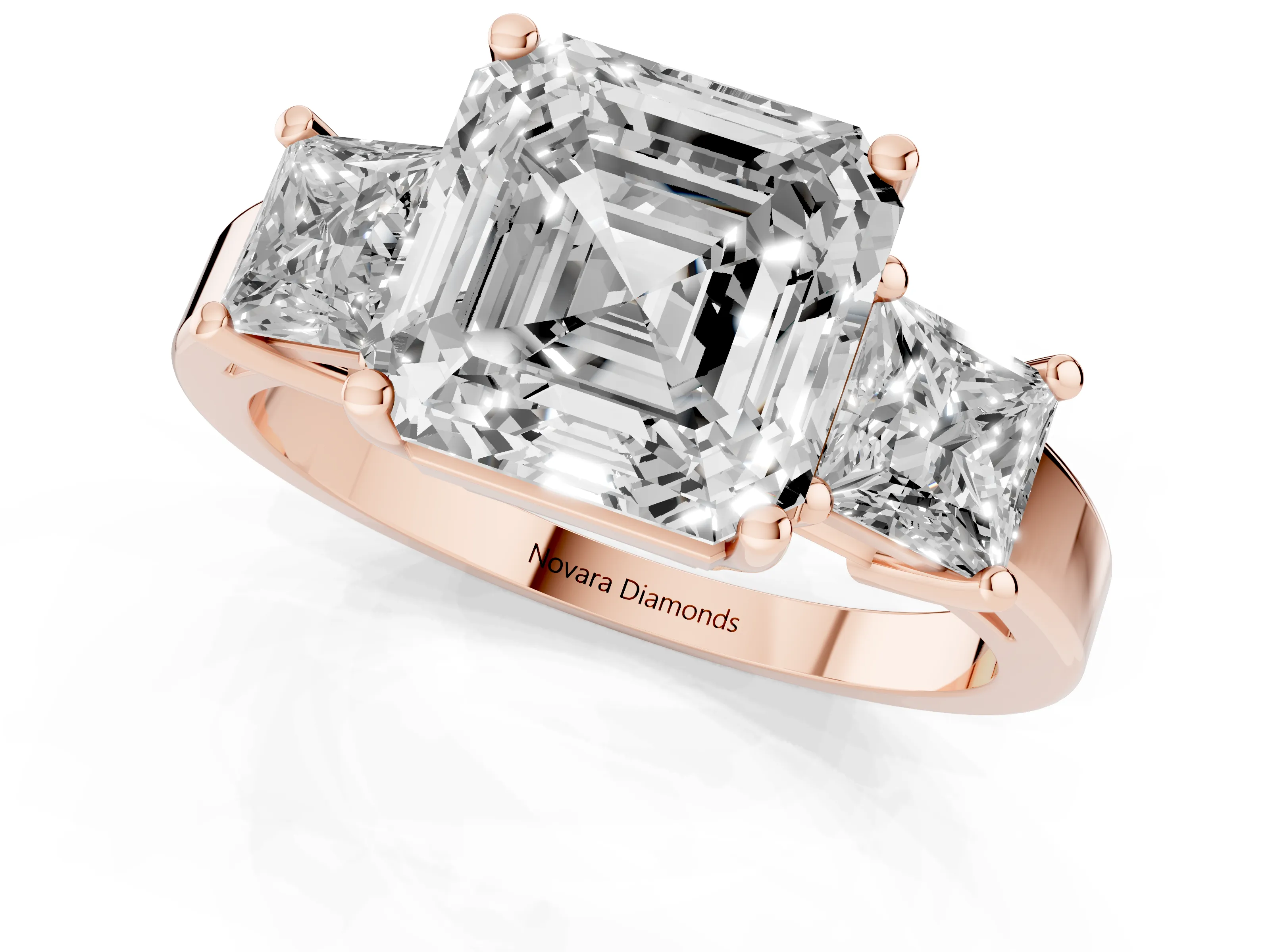 Three-Stone Asscher Cut Diamond Solitaire Ring Set in Rose gold with Prong Setting