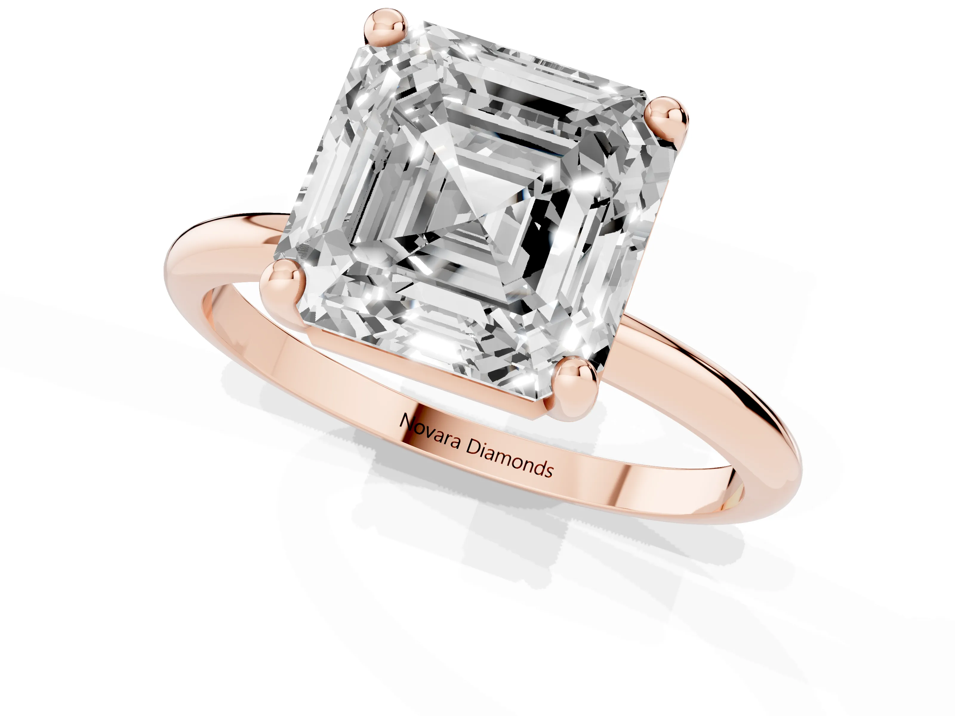 Asscher Cut Diamond Solitaire Ring Set in Rose gold with Secure Prong Setting on a Classic Band