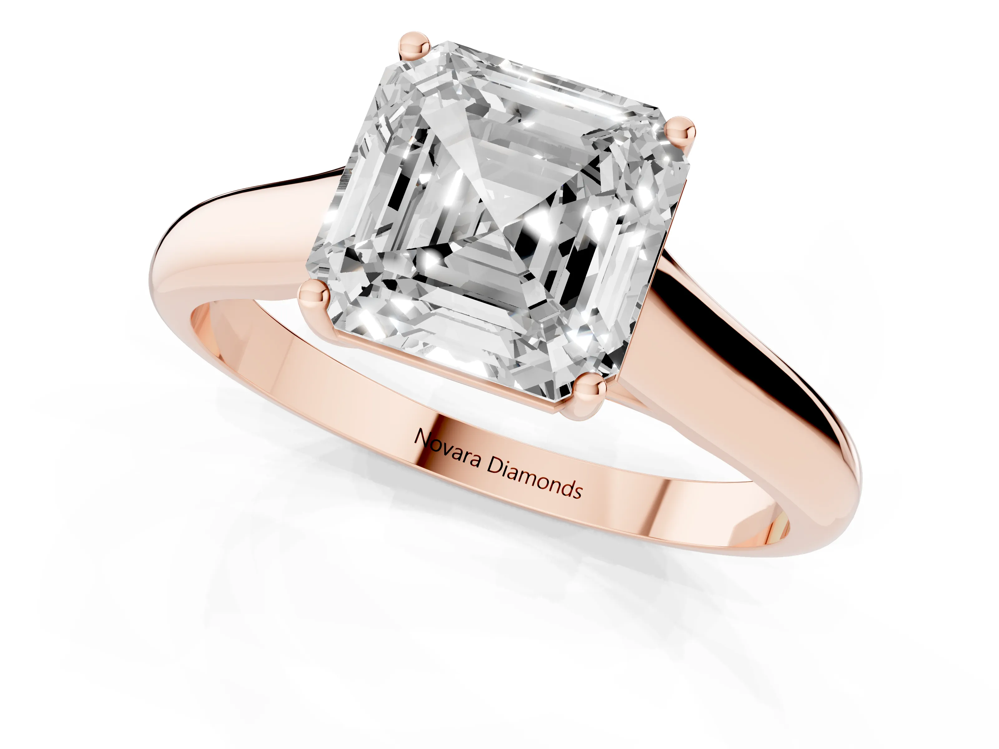 Asscher Cut Diamond Solitaire Engagement Ring Set in Rose gold with Subtly Tapered Band and Prong Setting