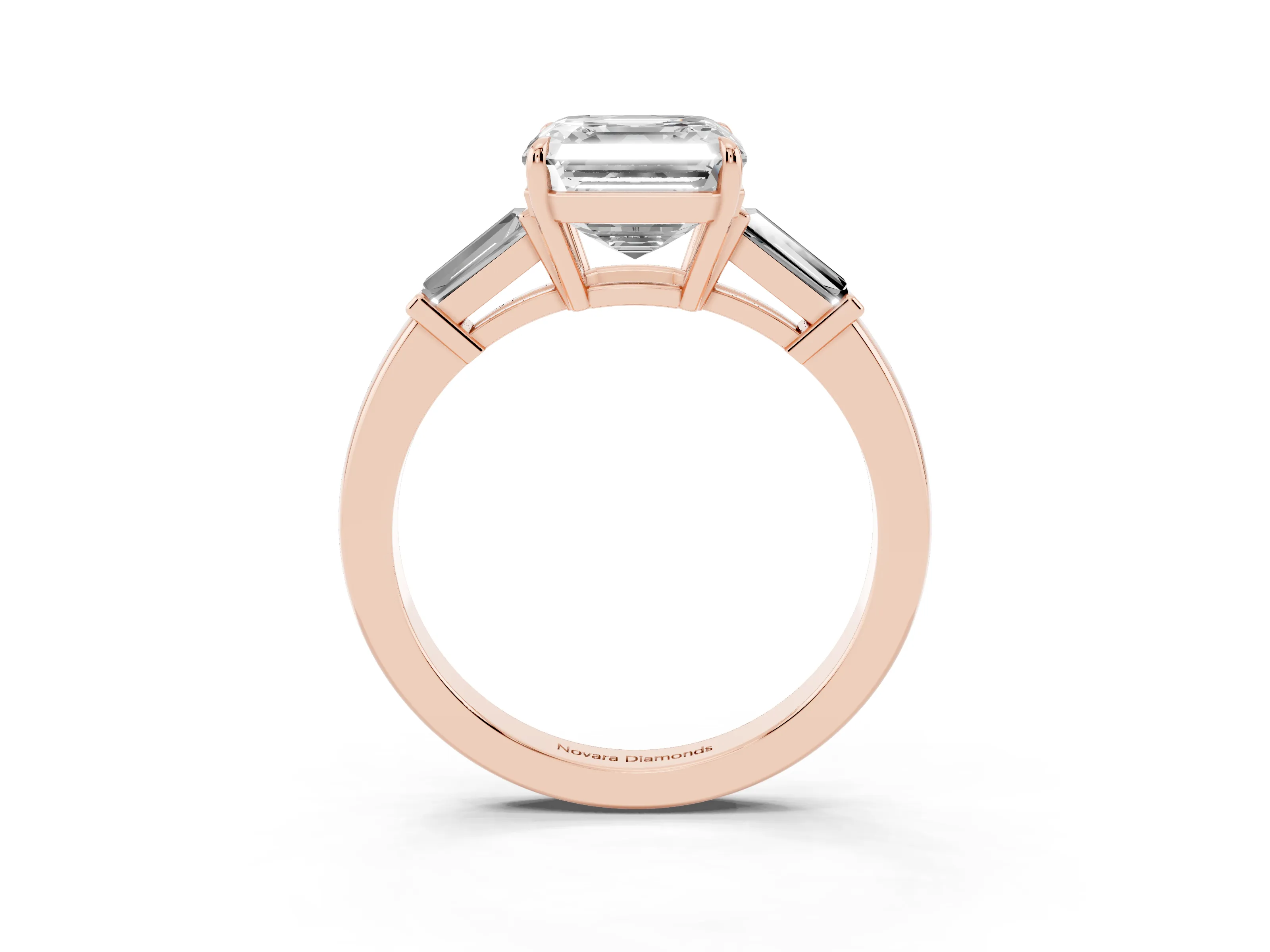 Asscher Cut Diamond Three-Stone Ring Set in Rose gold with Tapered Baguette Side Stones and Prong Setting