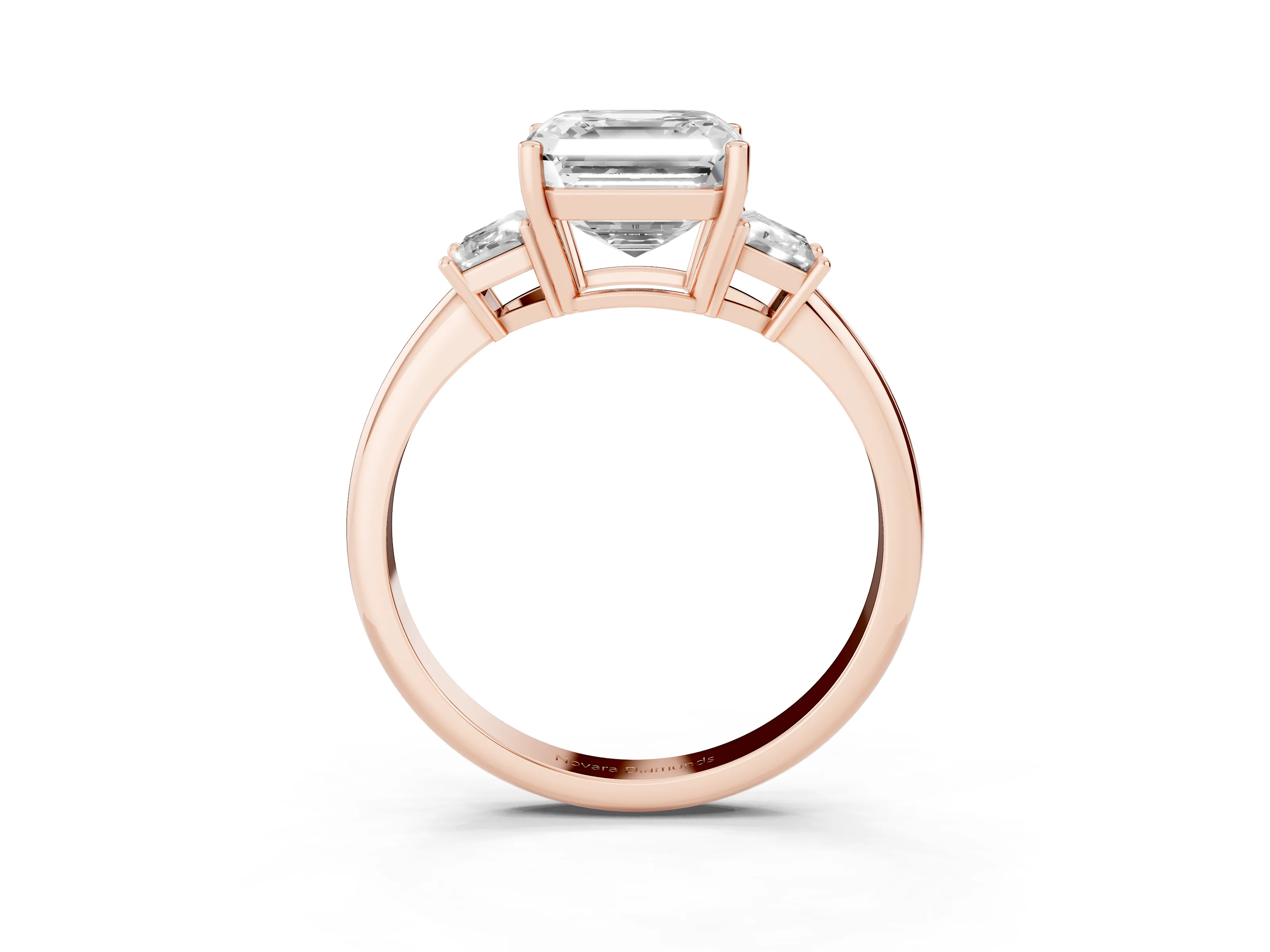 Asscher Cut Diamond Three-Stone Ring Set in Rose gold with Trapezoid Side Stones and Prong Setting