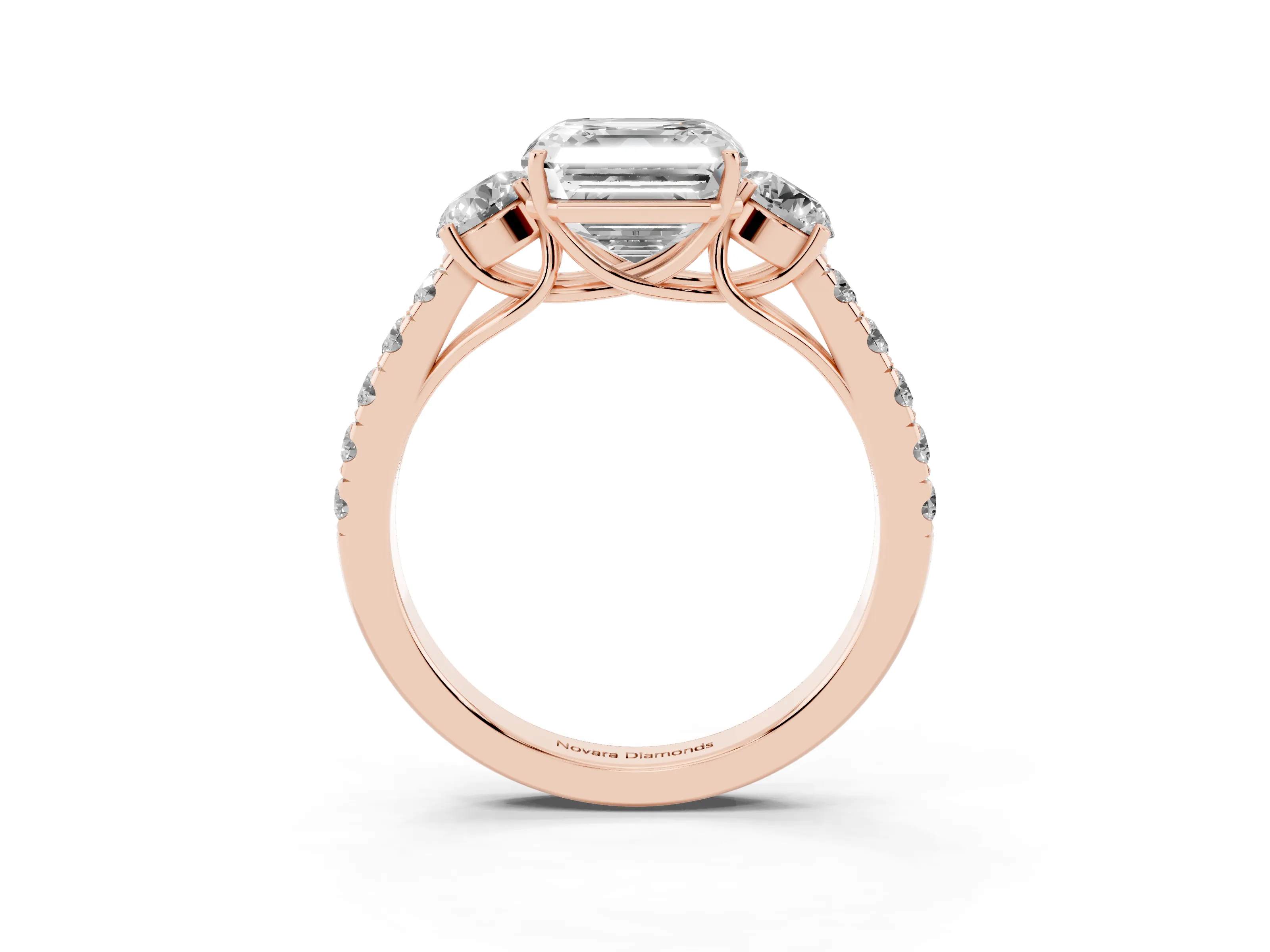 Asscher Cut Diamond Three-Stone Ring Set in Rose gold with Round Side Stones and Delicate Pavé Band