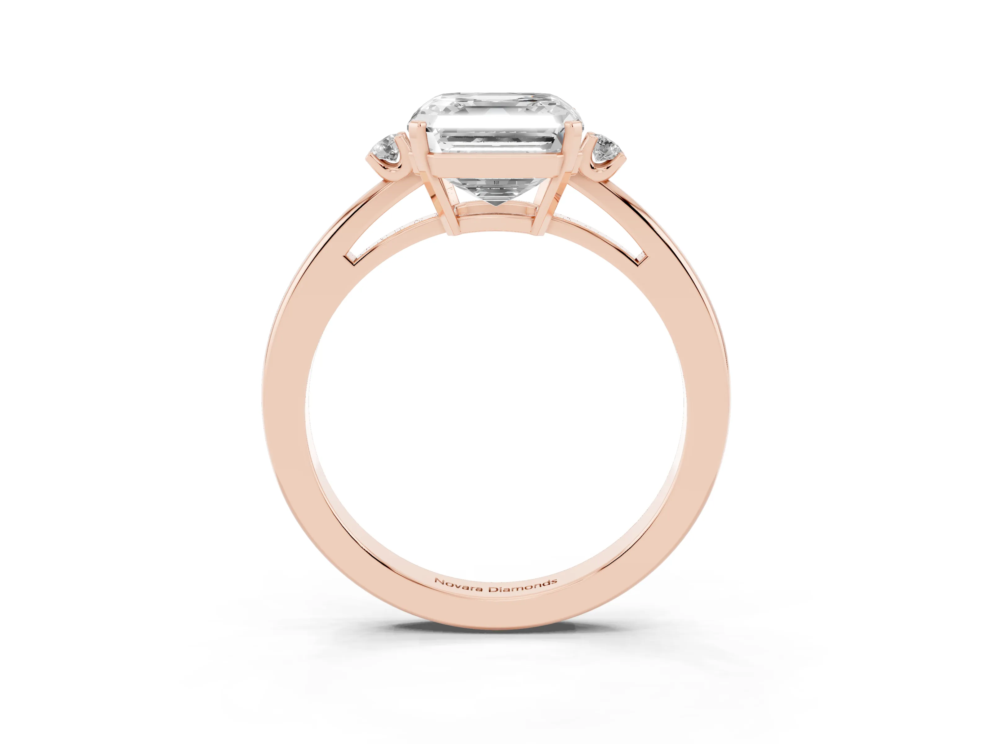 Three-Stone Asscher Cut Diamond Solitaire Ring Set in Rose gold with Round Accent Stones and Prong Setting
