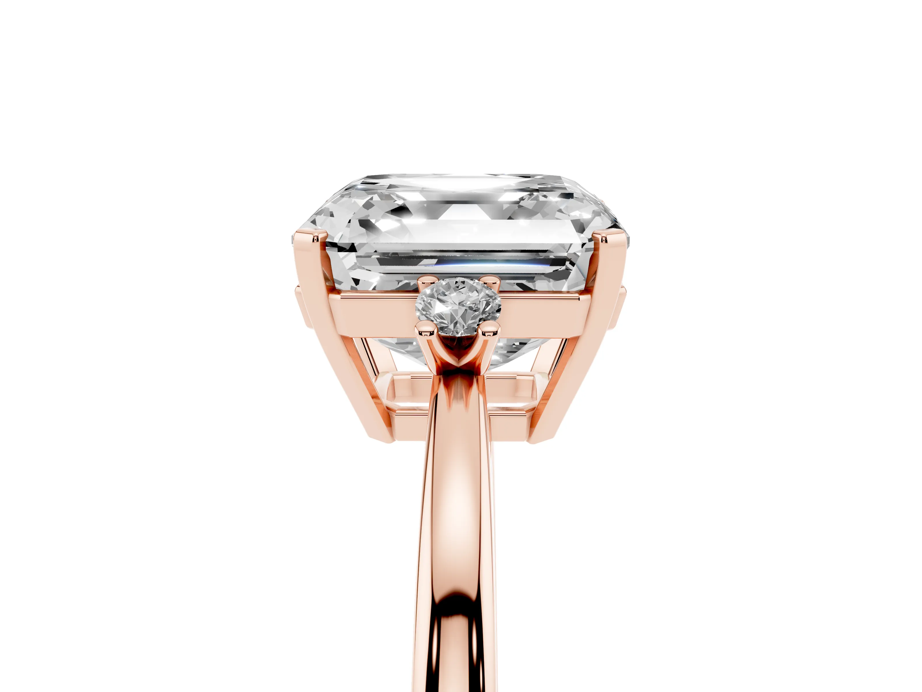 Three-Stone Asscher Cut Diamond Solitaire Ring Set in Rose gold with Round Accent Stones and Prong Setting