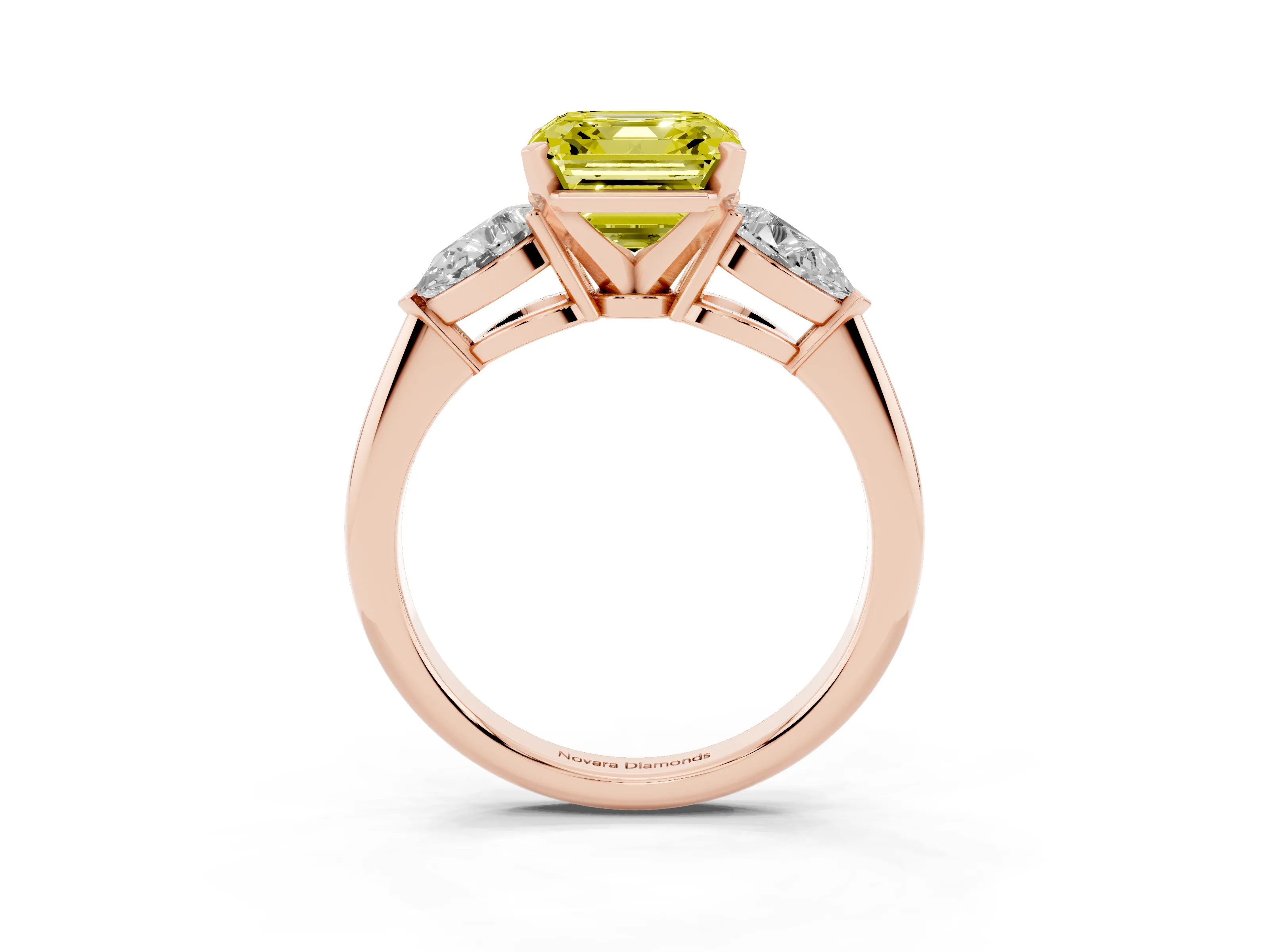 Fancy Yellow Three-Stone Asscher Cut Diamond Ring Set in Rose gold with Pear Side Stones and Prong Setting