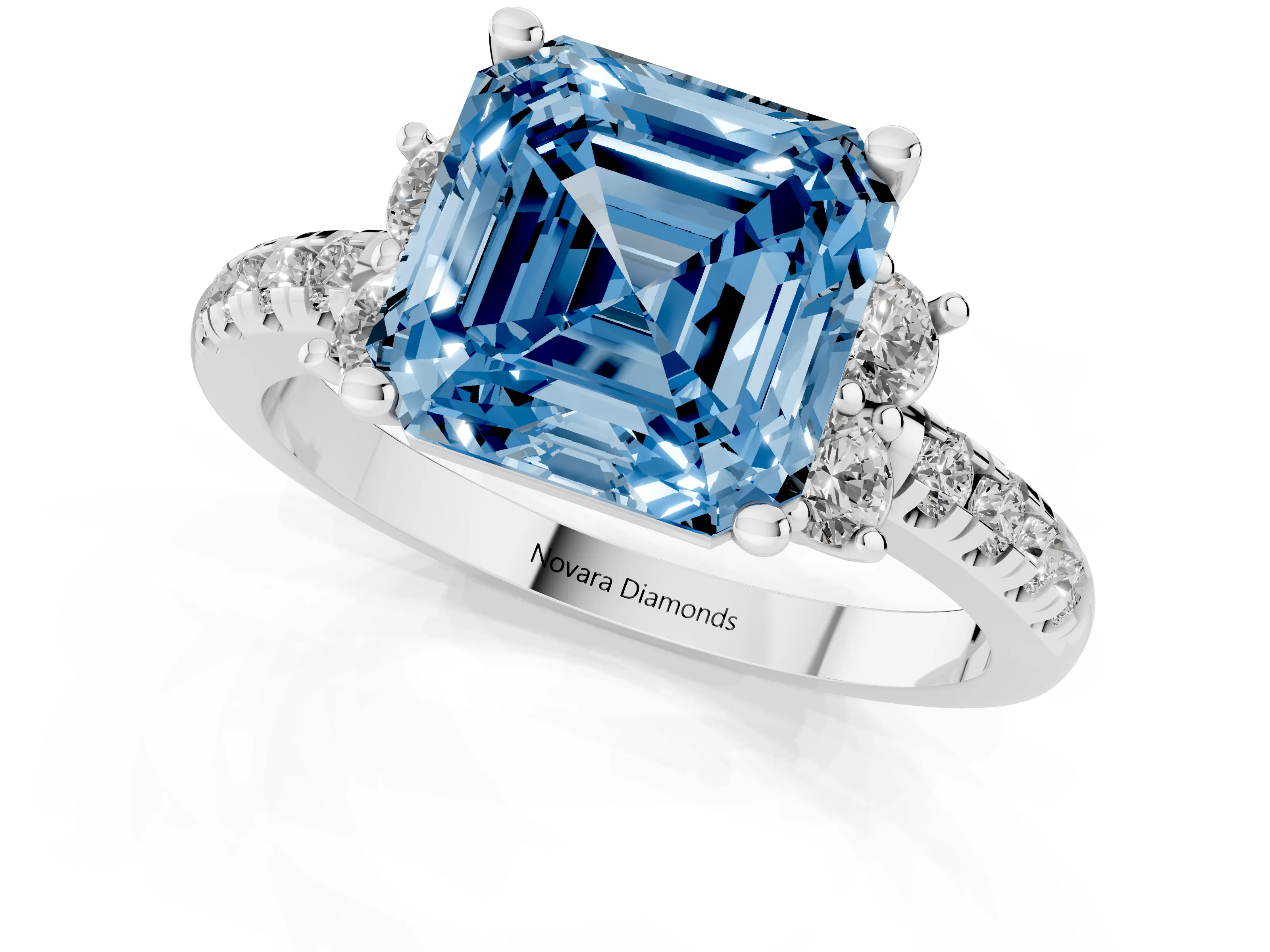 Fancy Blue Asscher Cut Diamond Three-Stone Pavé Ring Set in White gold with Prong Setting