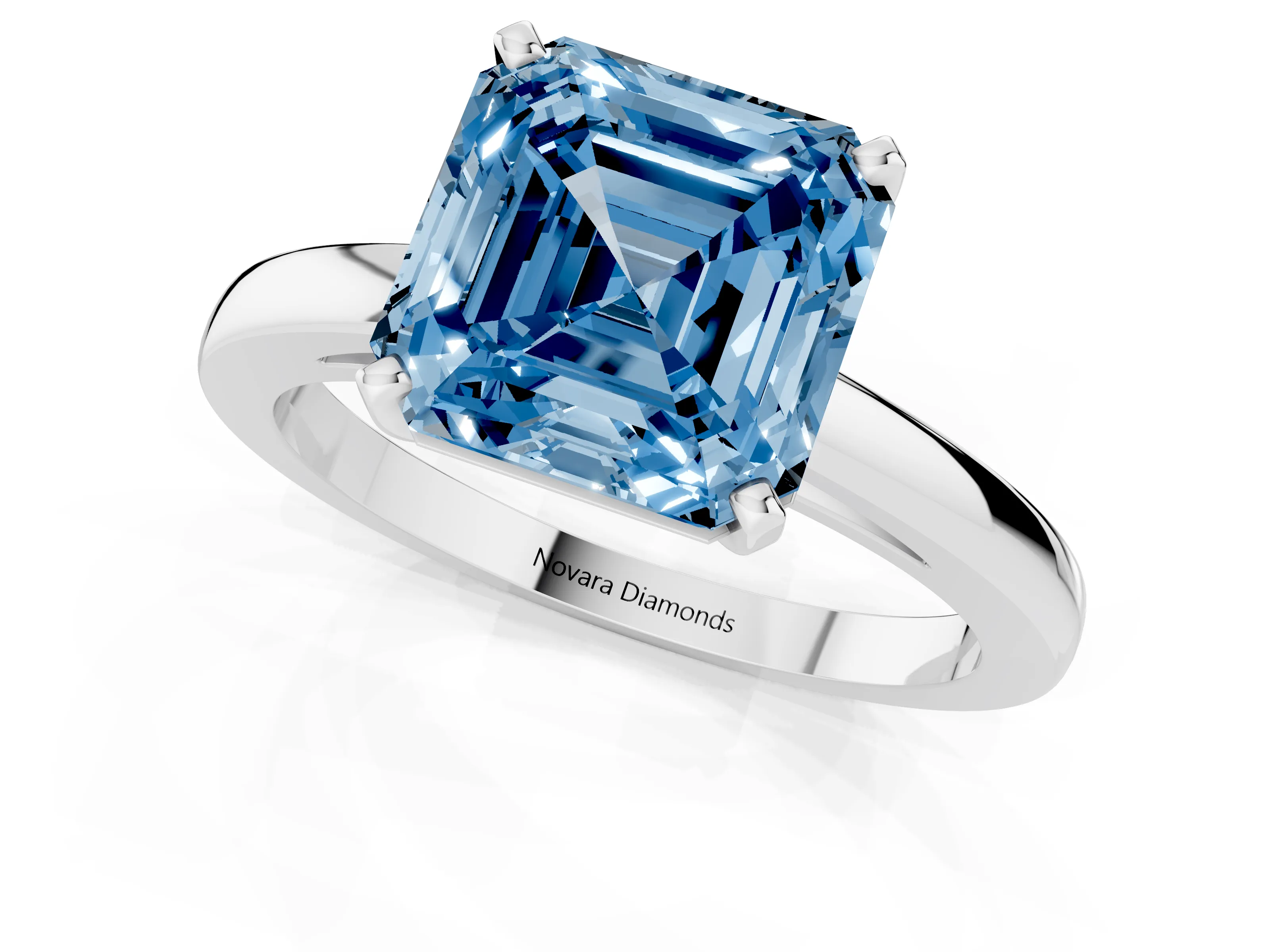 Fancy Blue Asscher Cut Diamond Solitaire Engagement Ring Set in White gold with Prong Setting on a Classic Band