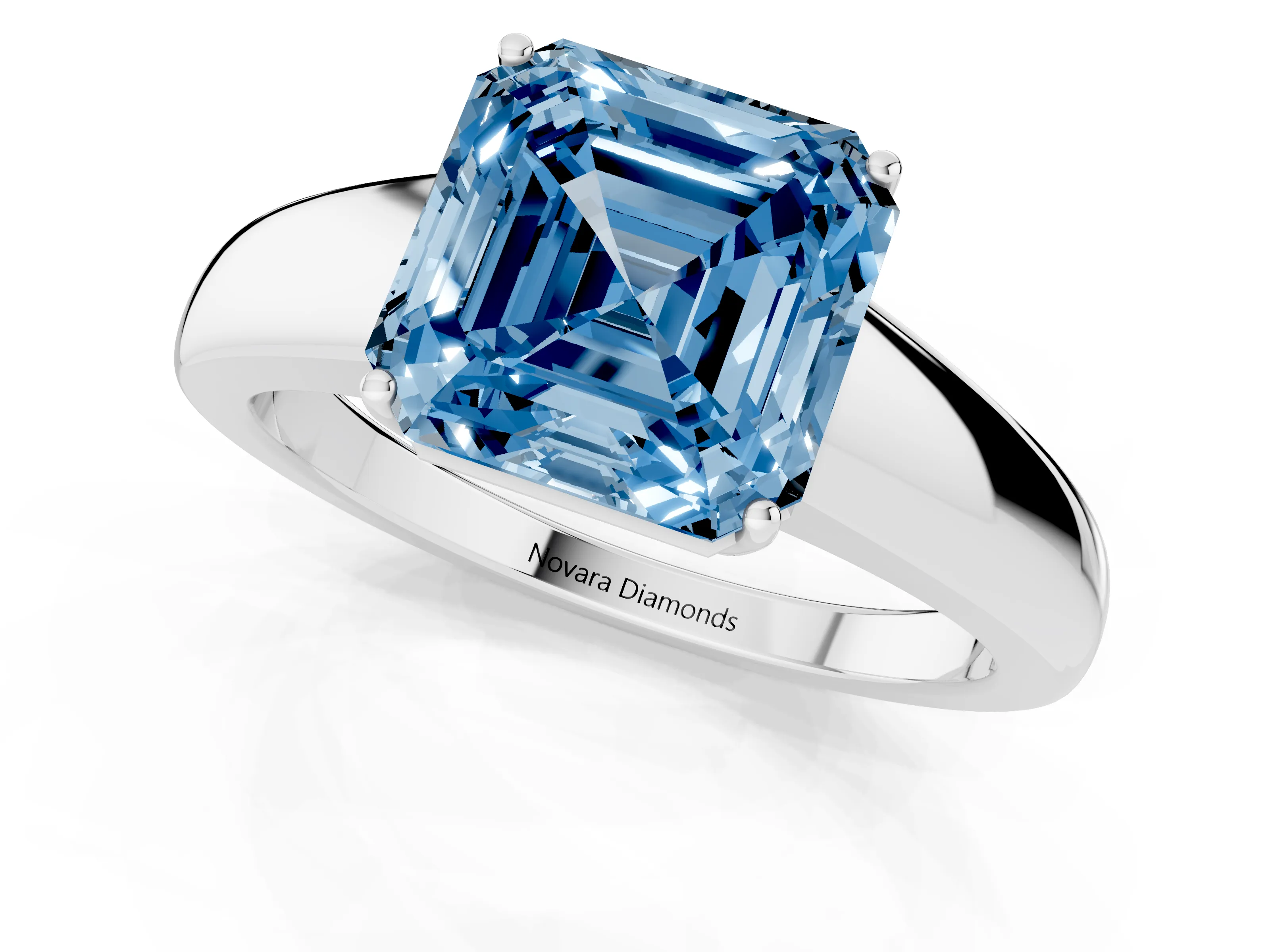 Fancy Blue Asscher Cut Diamond Solitaire Ring Set in White gold with Tapered Band and Prong Setting
