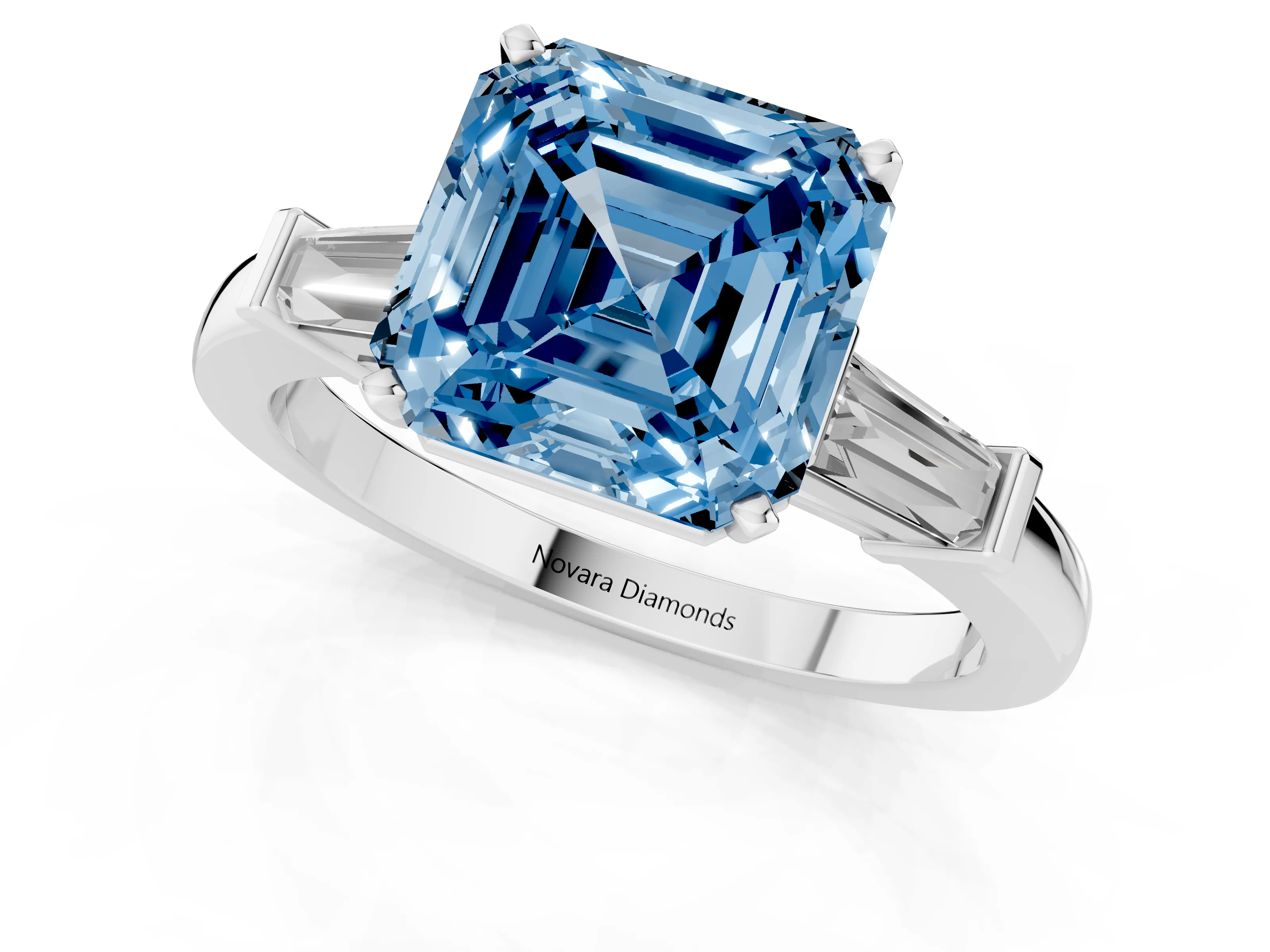 Fancy Blue Asscher Cut Diamond Solitaire Ring Set in White gold with Tapered Baguette Accents and Prong Setting