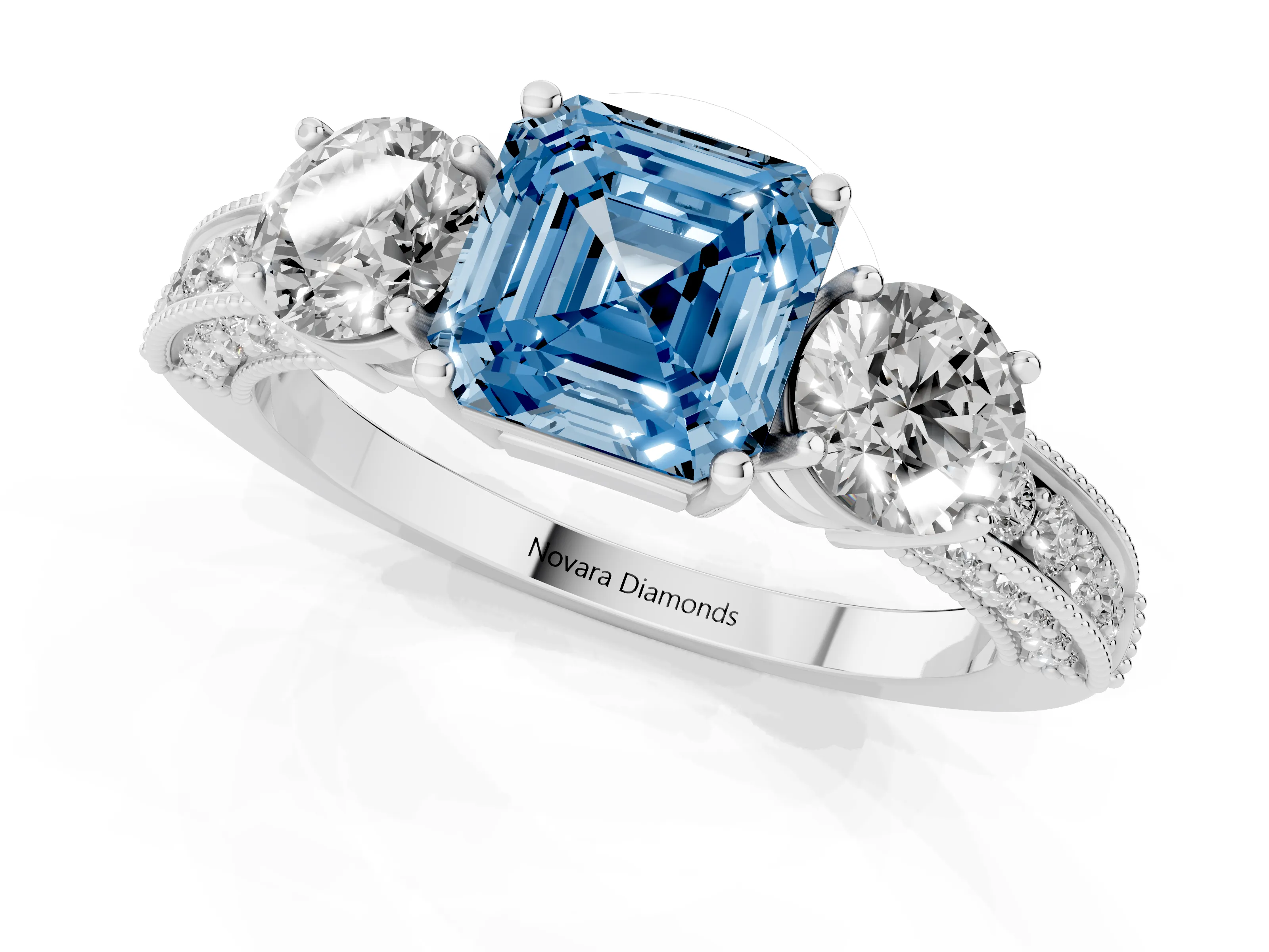 Fancy Blue Asscher Cut Diamond Three-Stone Ring Set in Platinum with Round Side Stones and Pavé Band