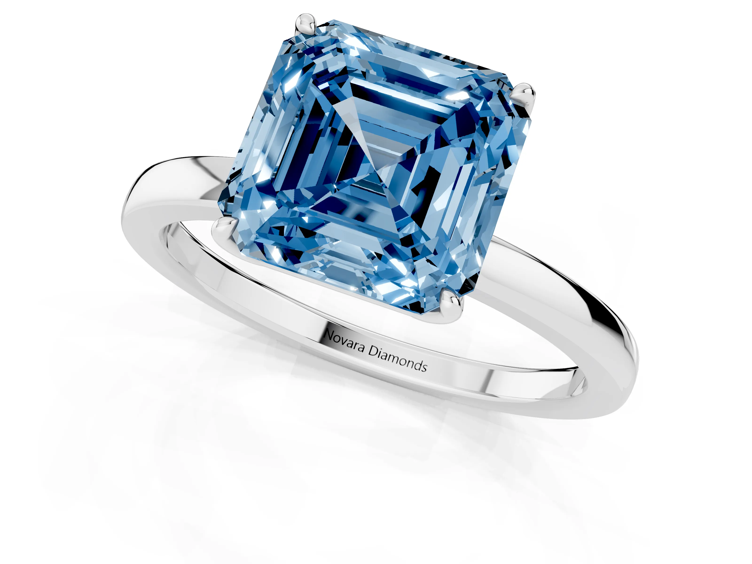 Fancy Blue Asscher Cut Diamond Solitaire Ring Set in Silver with Prong Setting and Thin Polished Band