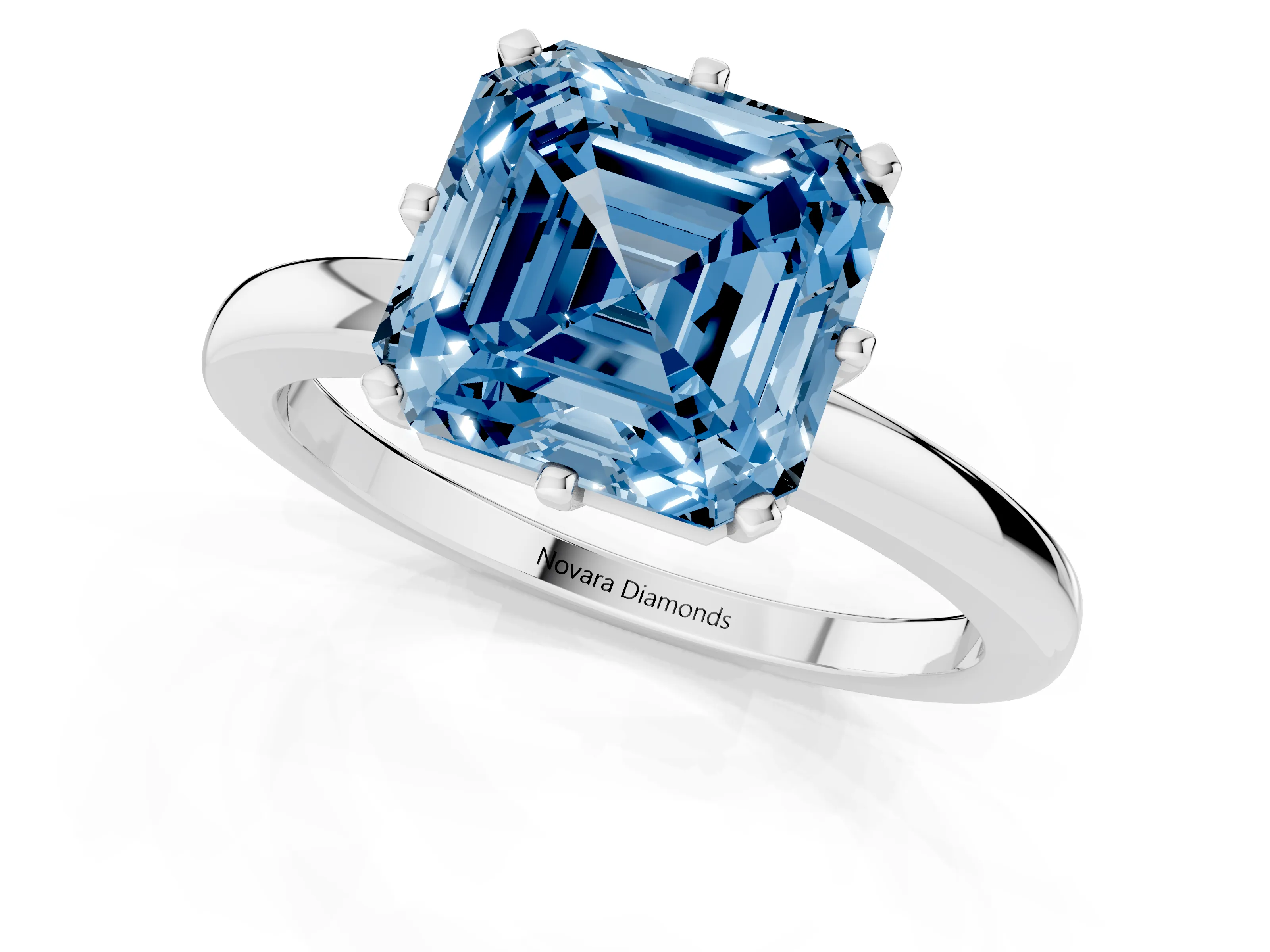 Fancy Blue Asscher Cut Diamond Solitaire Ring Set in Silver with Raised Prong Setting on a Classic Band