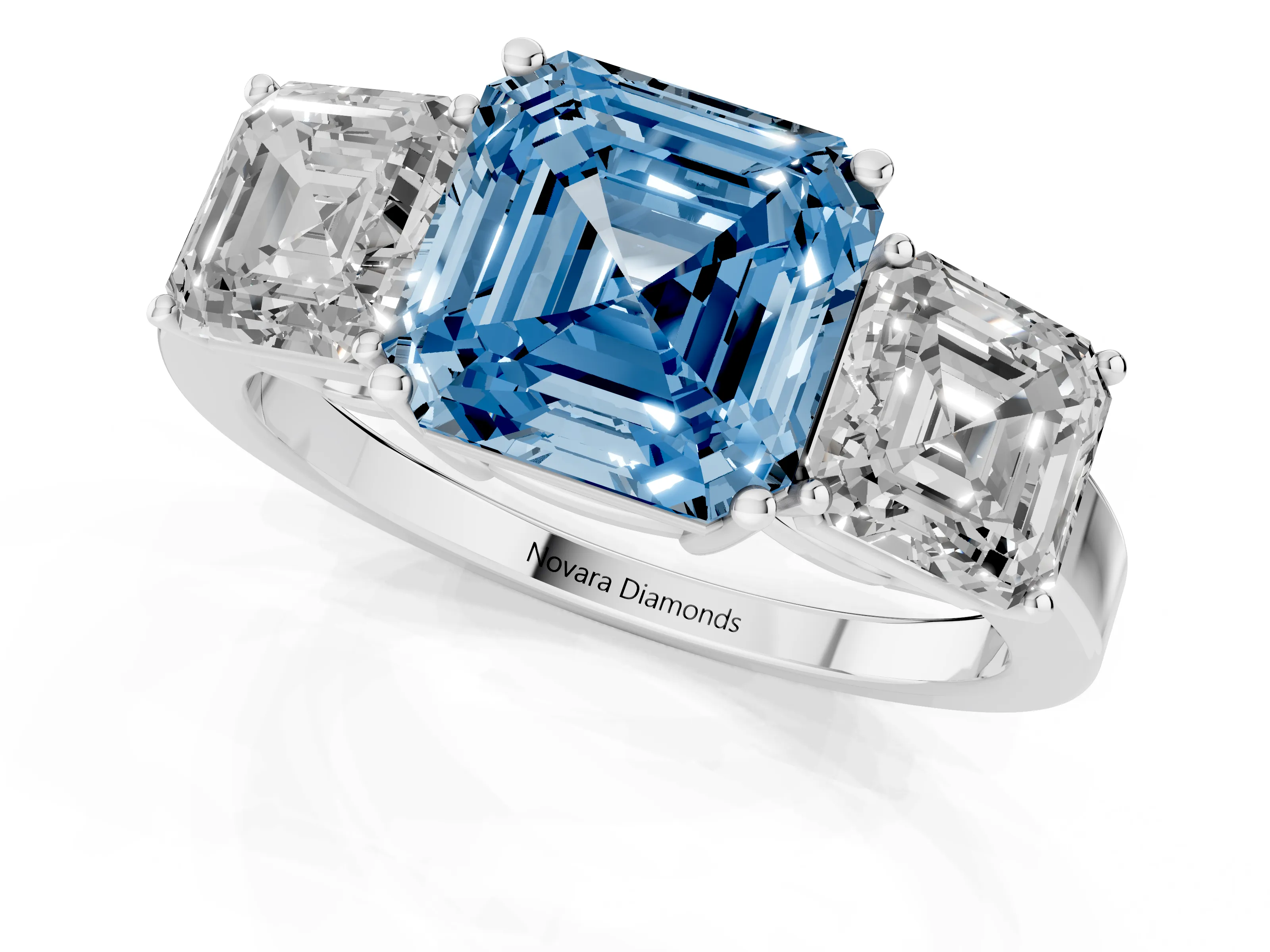 Fancy Blue Asscher Cut Diamond Three-Stone Engagement Ring Set in Platinum with Flat Band