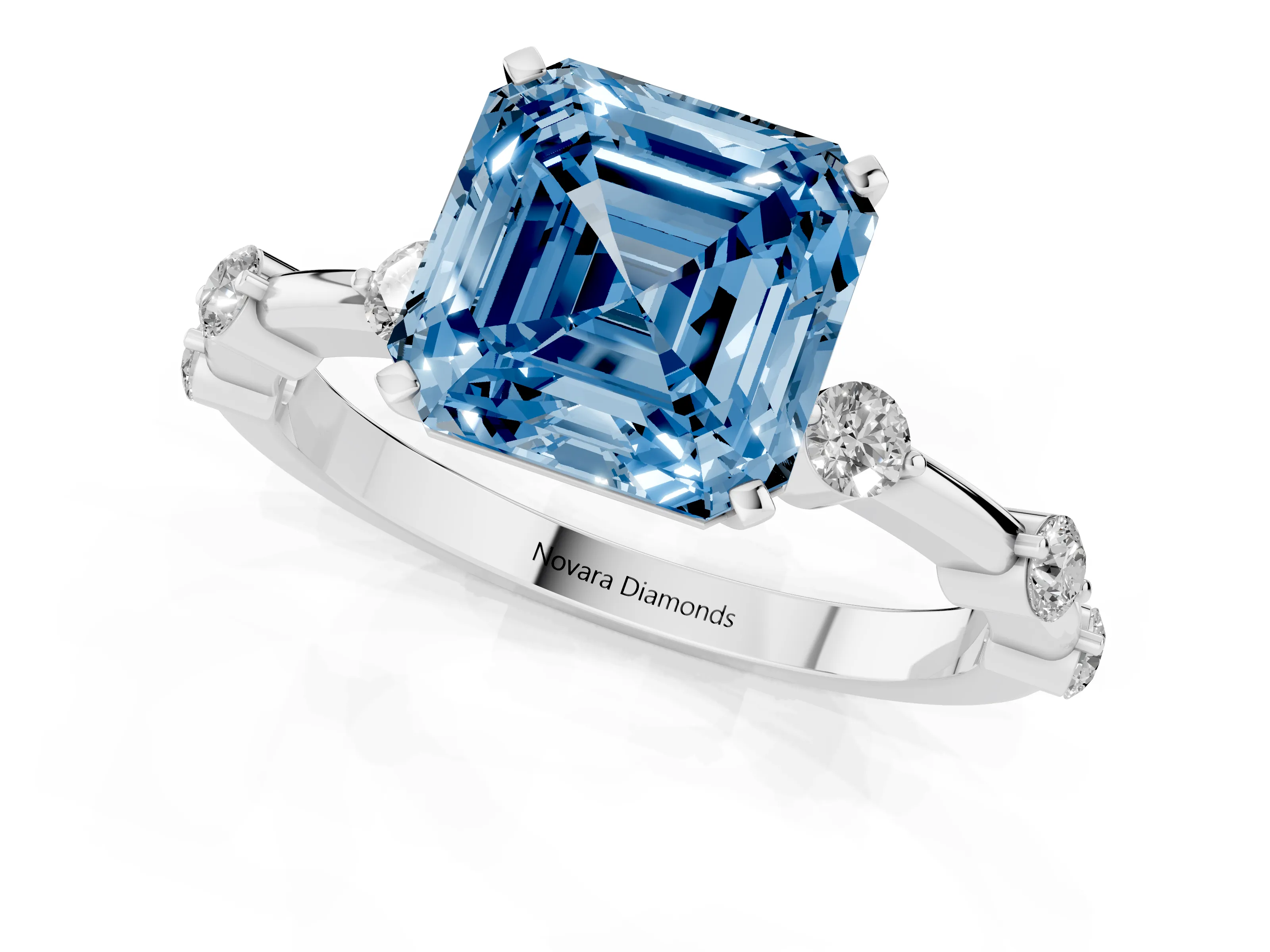 Fancy Blue Asscher Cut Diamond Solitaire Ring Set in Silver with Bezel Set Side Stones and Prong Setting