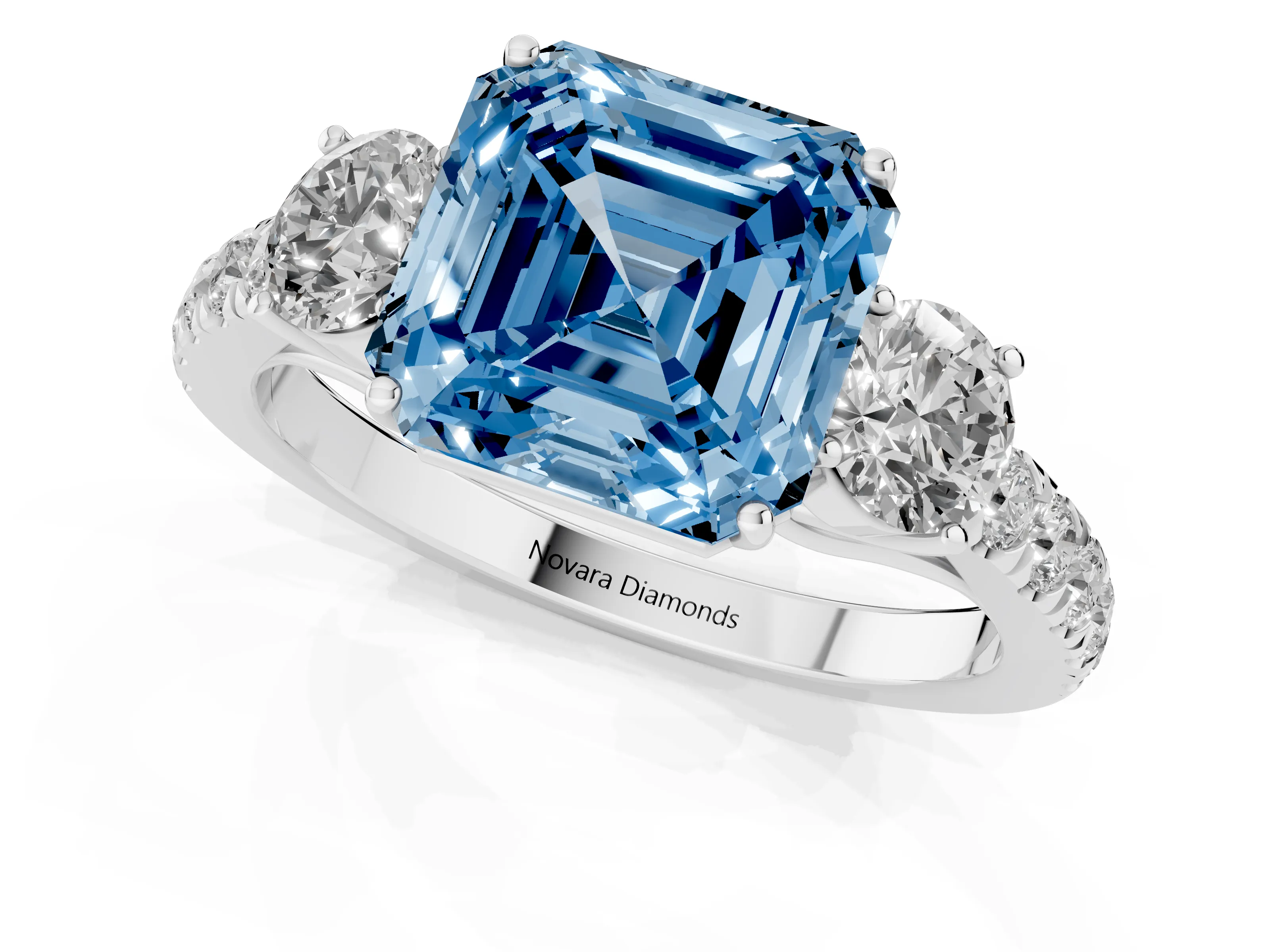 Fancy Blue Asscher Cut Diamond Three-Stone Ring Set in Silver with Round Side Stones and Delicate Pavé Band