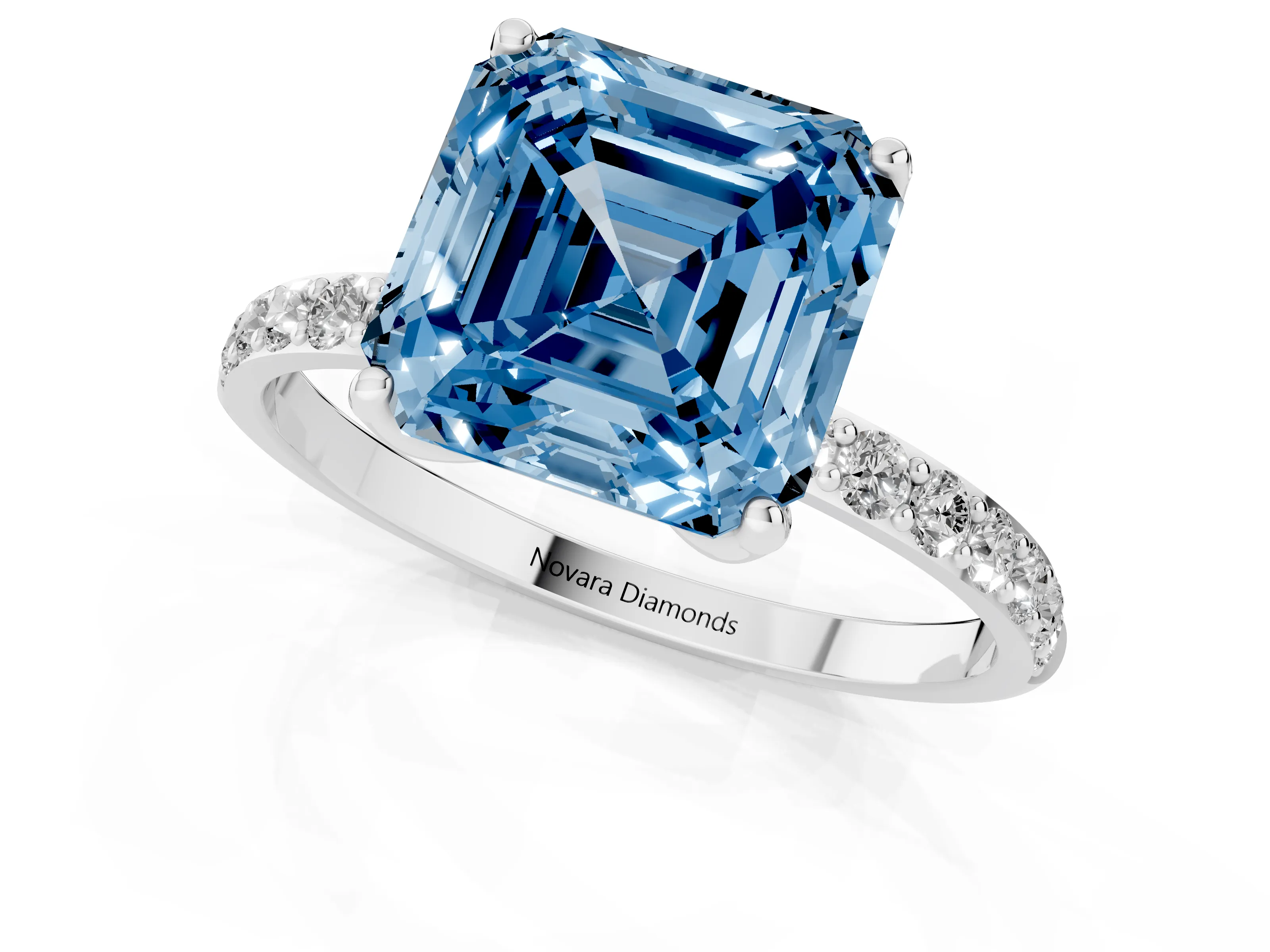 Fancy Blue Asscher Cut Diamond Solitaire Engagement Ring Set in White gold with Round Pavé Band and Prong Setting