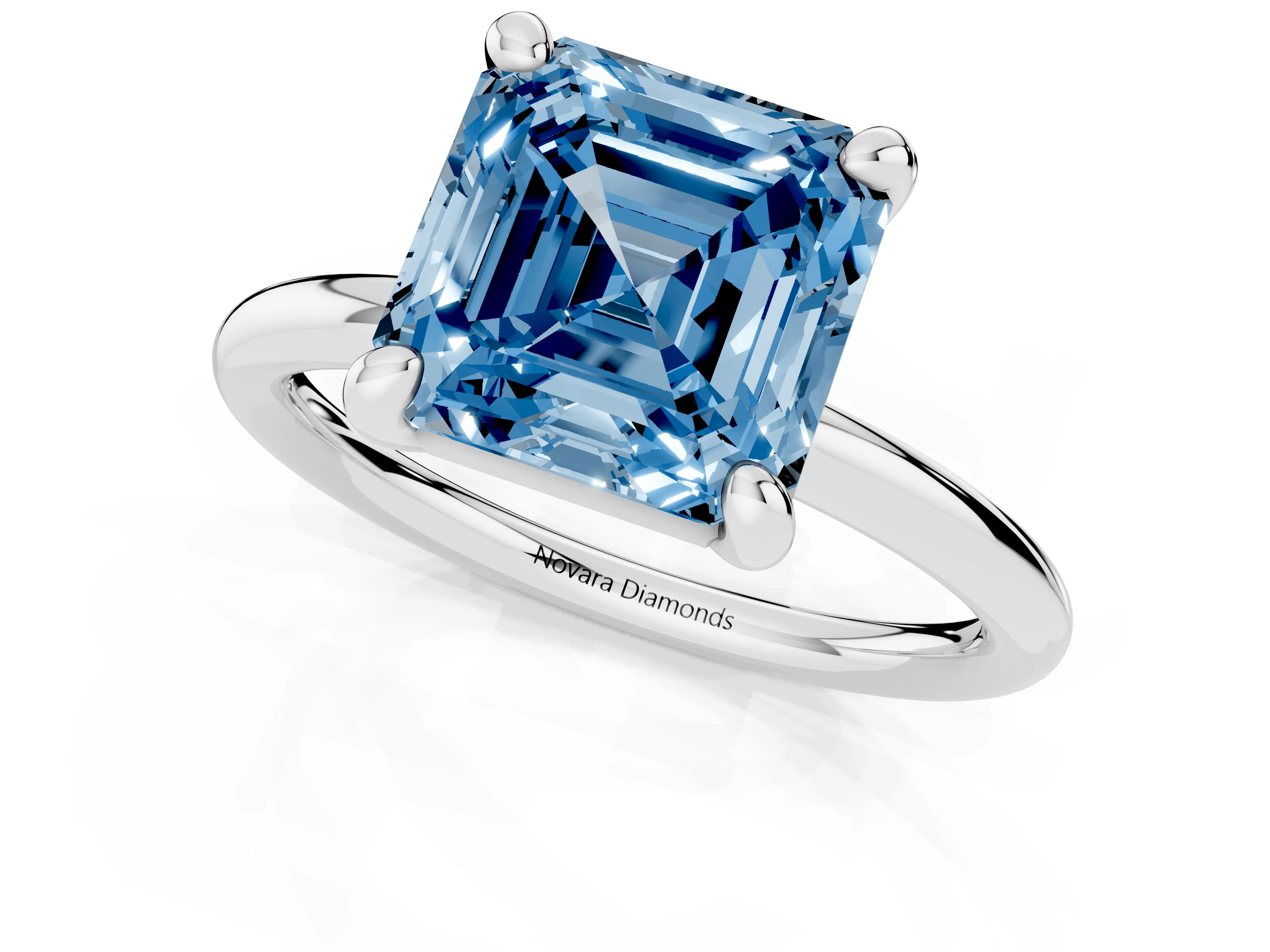 Fancy Blue Asscher Cut Diamond Solitaire Ring Set in White gold with Prong Setting on a Polished Plain Band