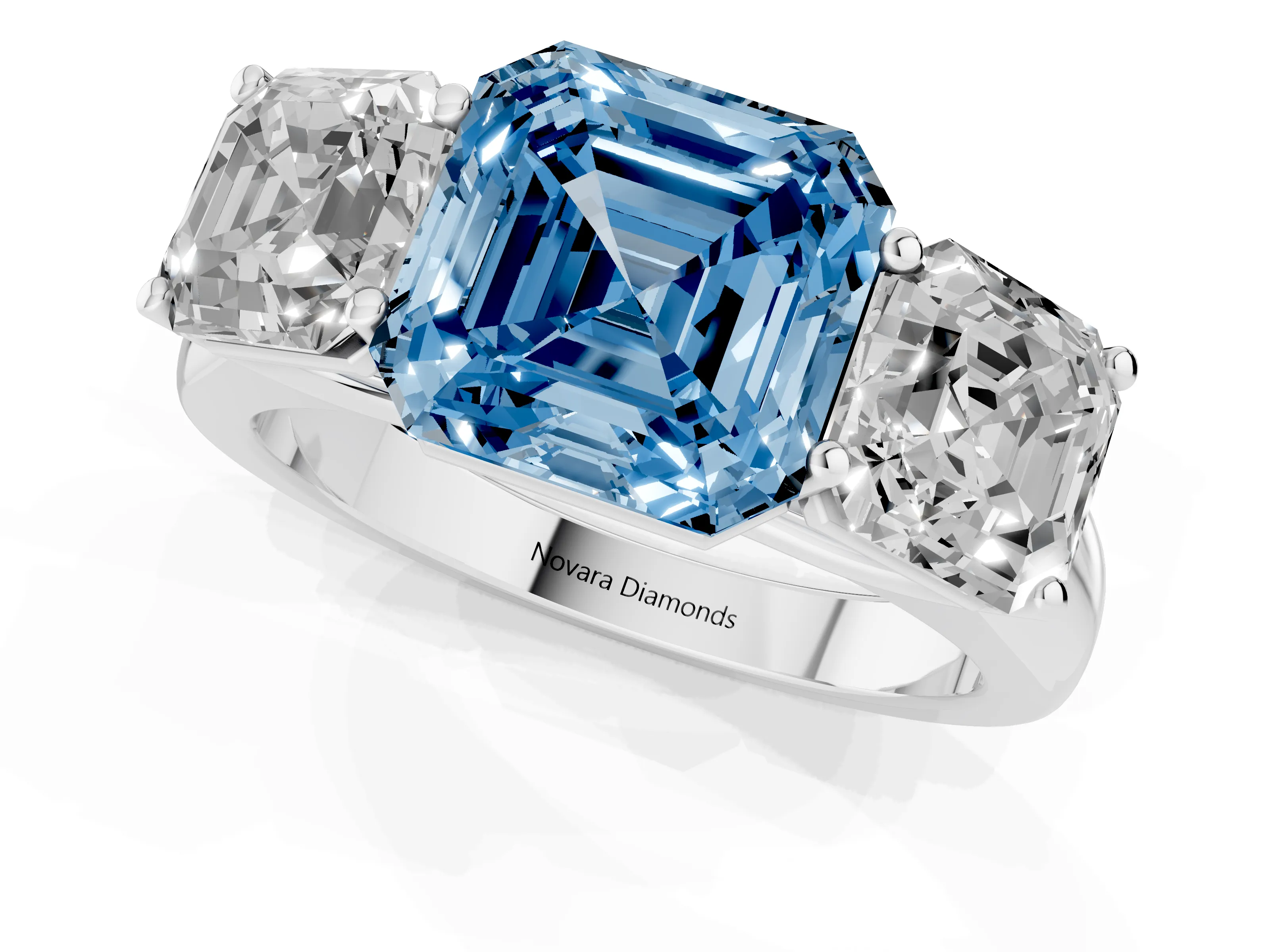 Fancy Blue Asscher Cut Diamond Three-Stone Ring Set in White gold with Plain Polished Band