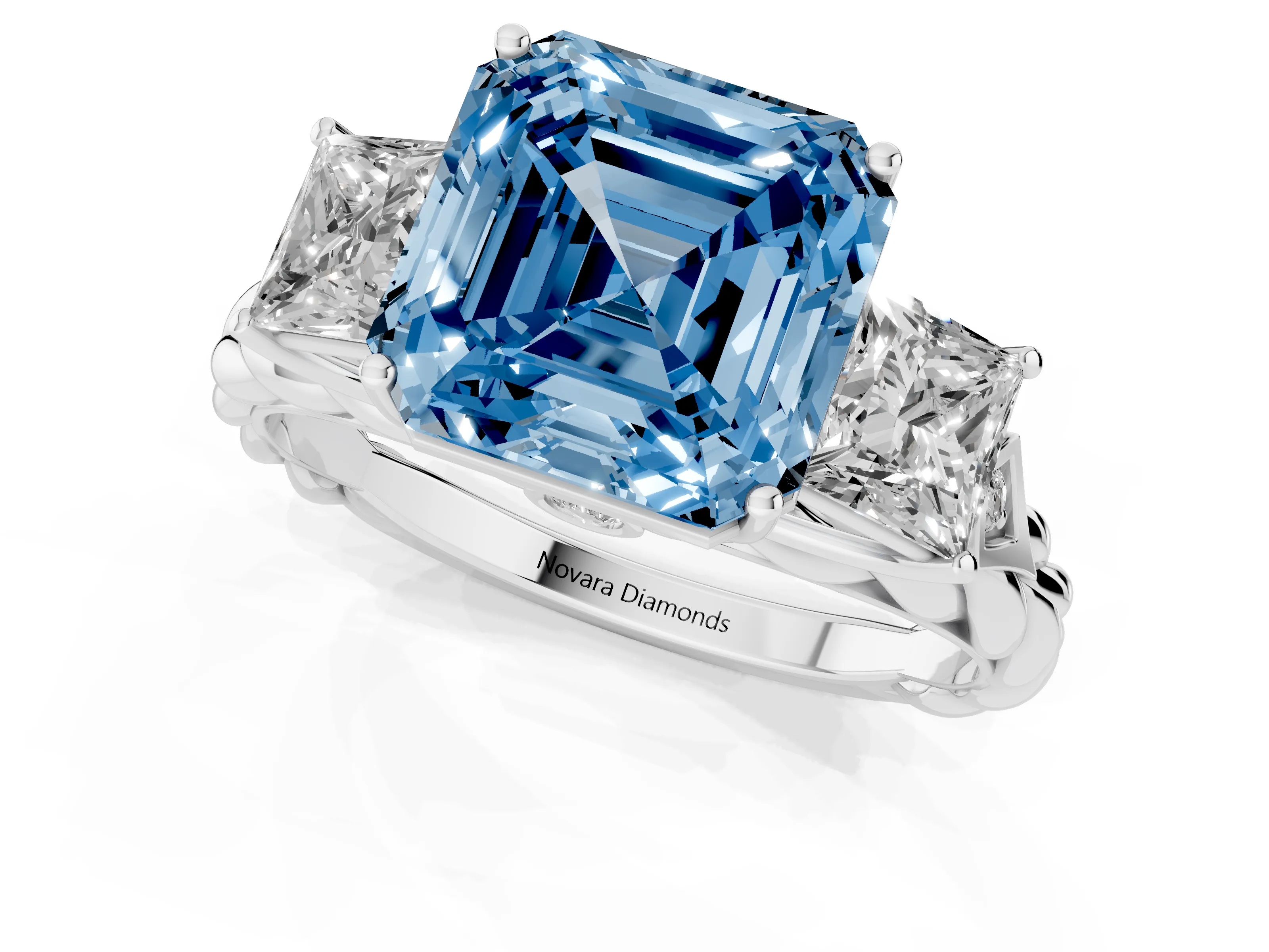 Fancy Blue Asscher Cut Diamond Three-Stone Ring Set in White gold with Braided Band